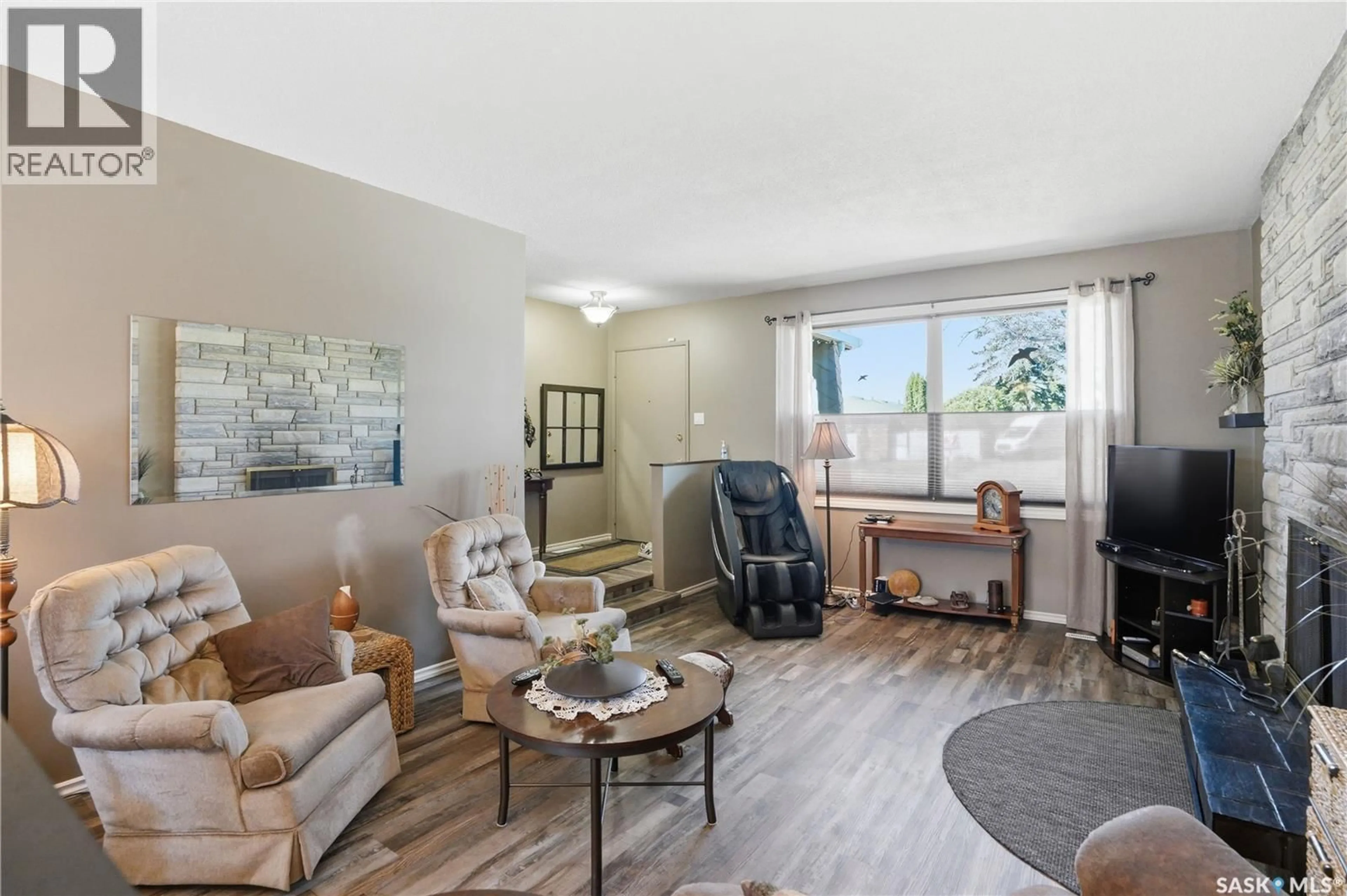 Living room with furniture, unknown for 1912 95TH STREET, North Battleford Saskatchewan S9A3C7
