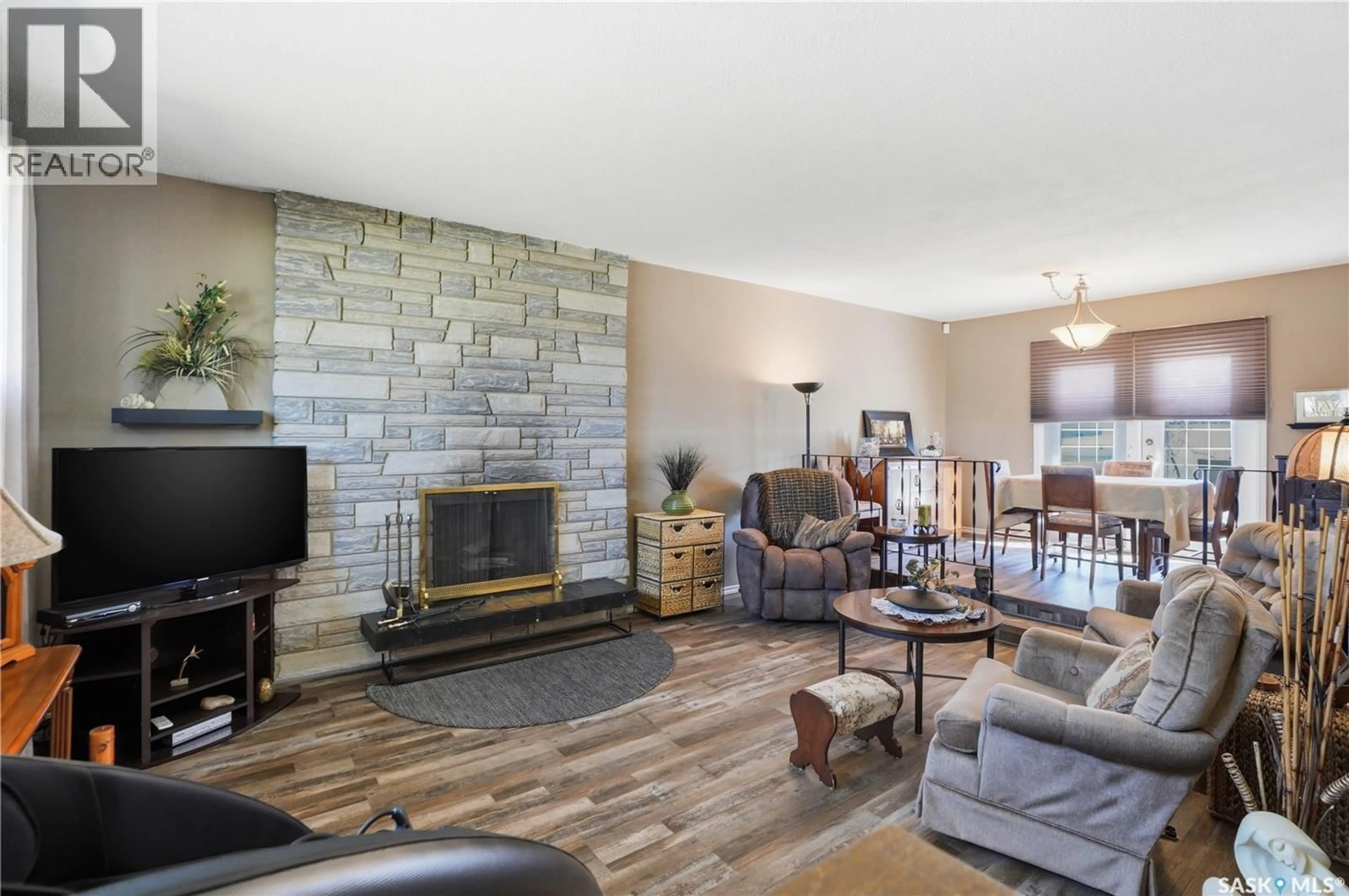 Living room with furniture, unknown for 1912 95TH STREET, North Battleford Saskatchewan S9A3C7