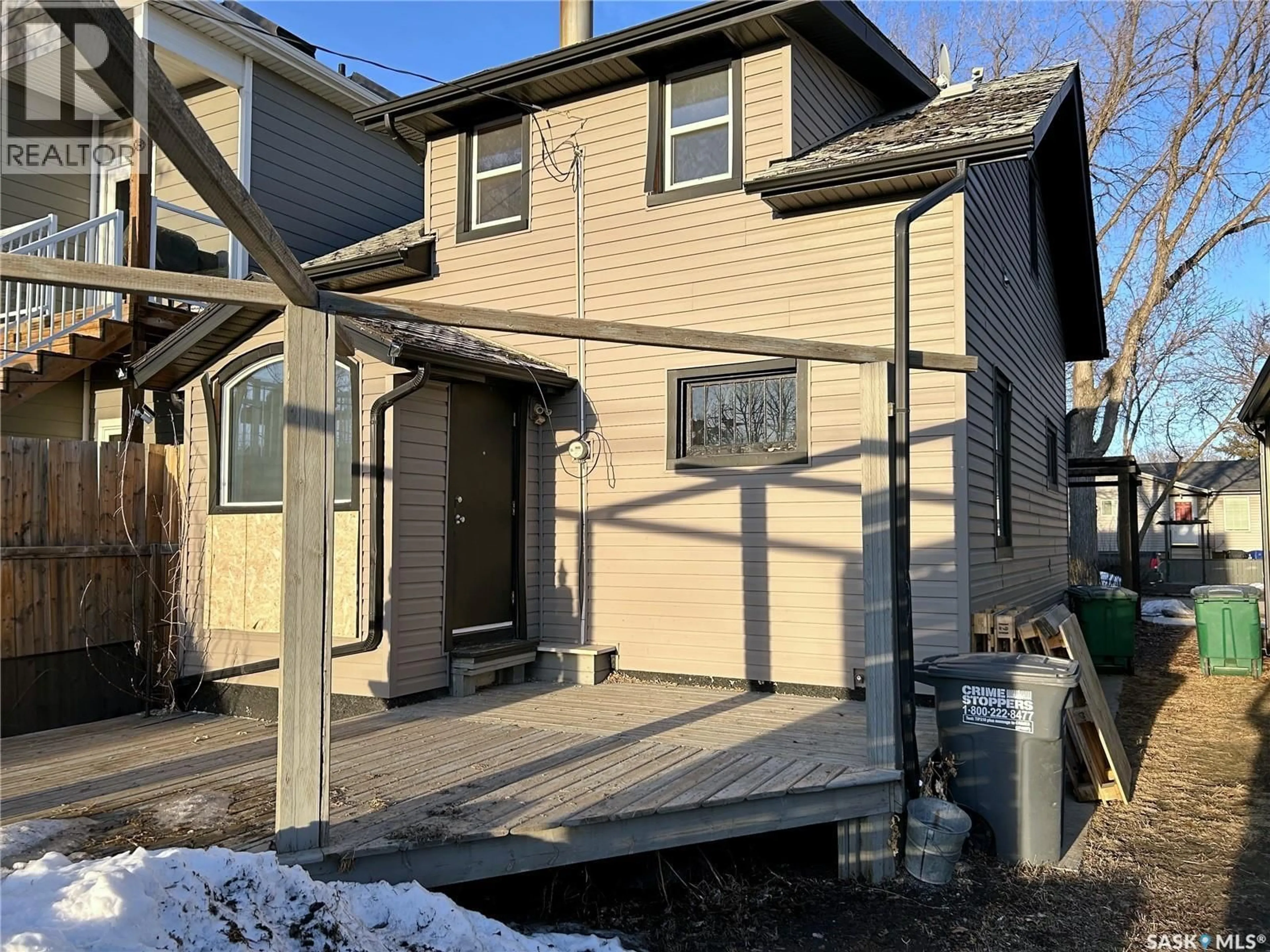Home with vinyl exterior material, street for 515 J AVENUE, Saskatoon Saskatchewan S7M2A7