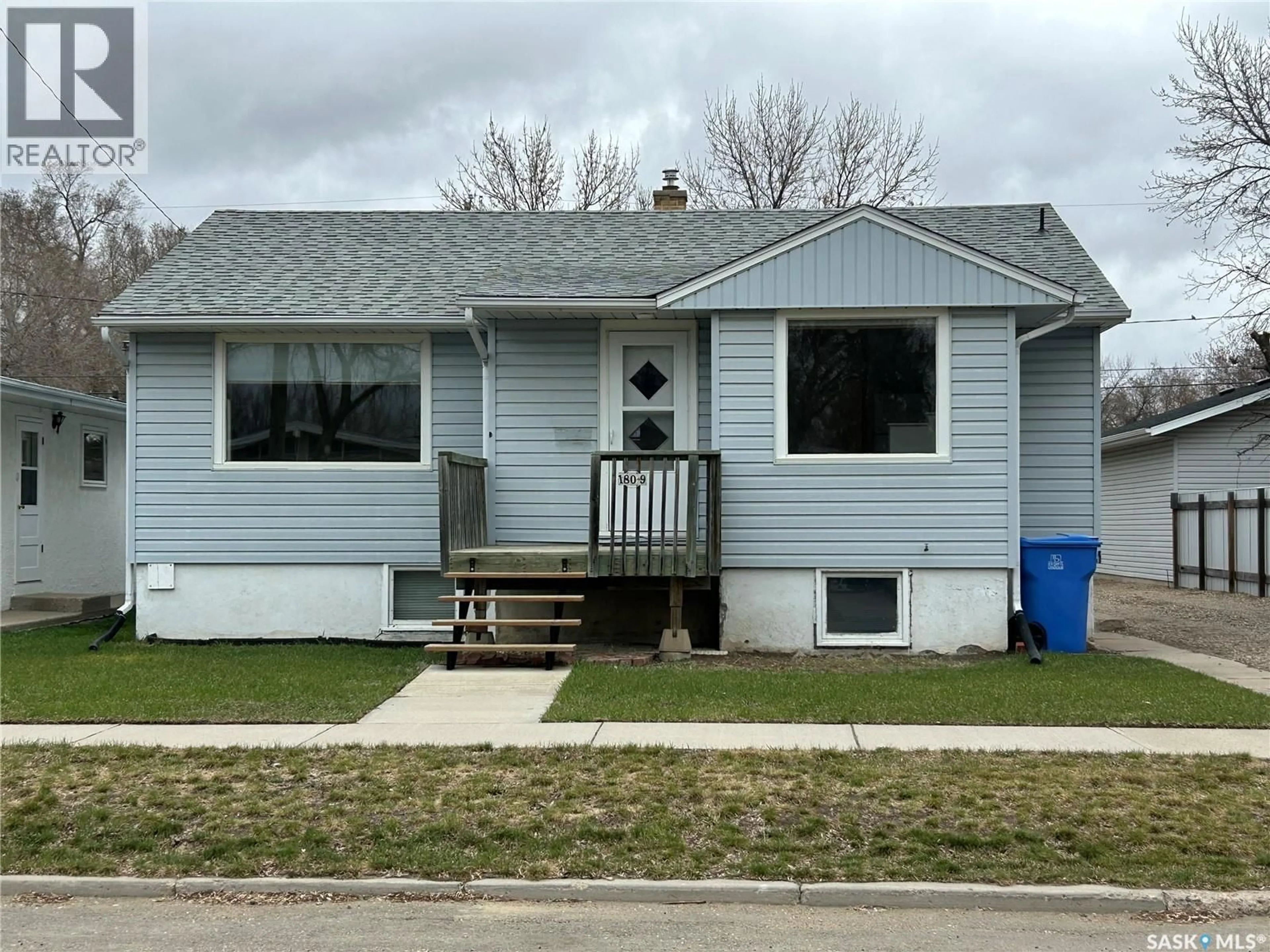 Home with vinyl exterior material, street for 1809 2ND STREET, Estevan Saskatchewan S4A0N4