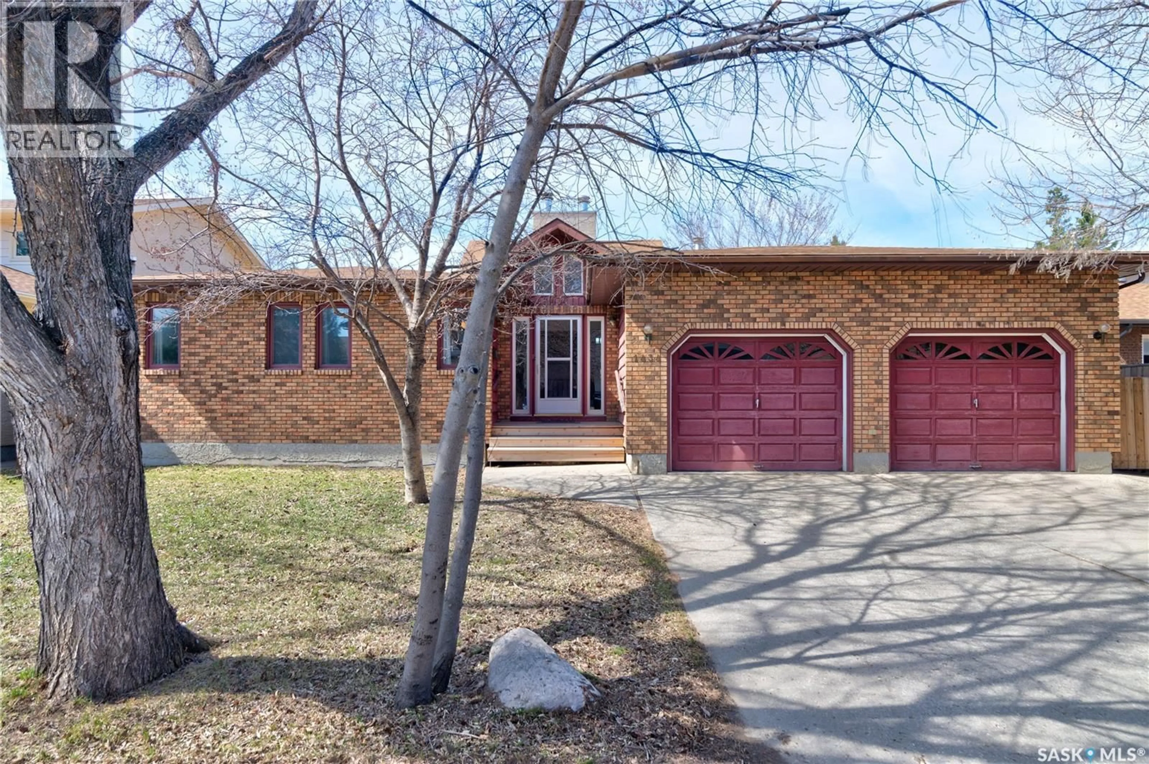 Home with brick exterior material, street for 1434 SIDLER DRIVE, Regina Saskatchewan S4X4A5