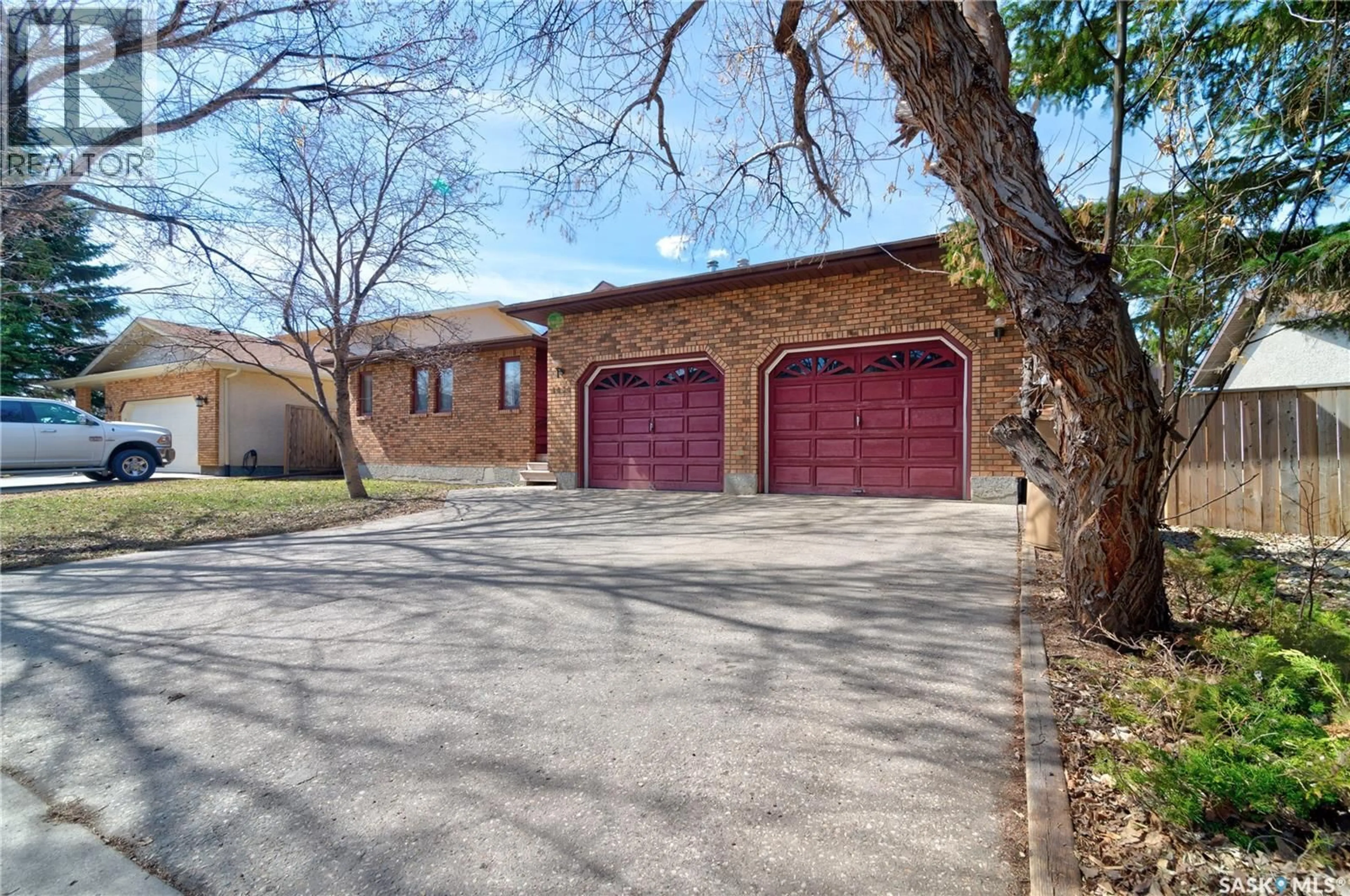 Home with brick exterior material, street for 1434 SIDLER DRIVE, Regina Saskatchewan S4X4A5