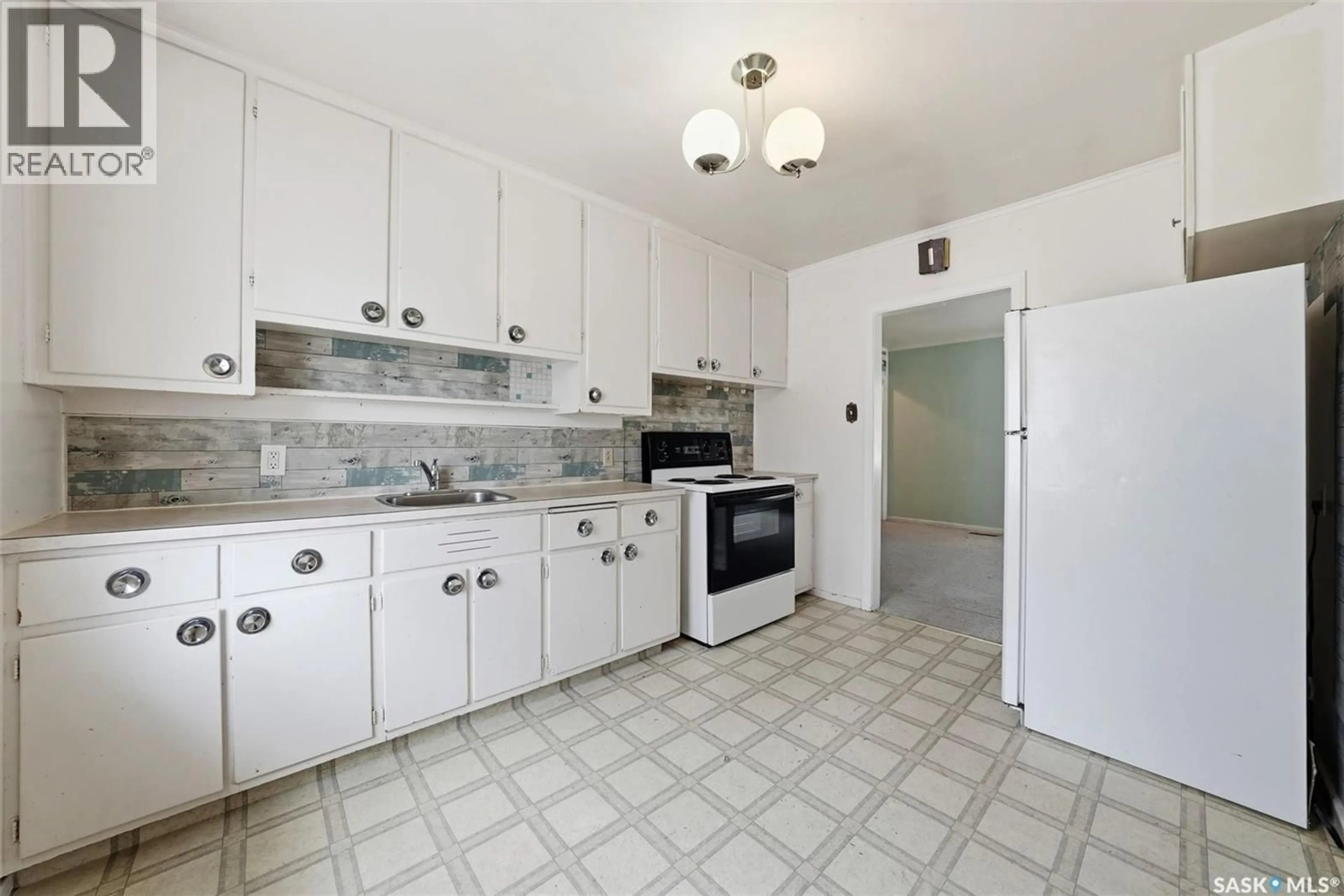 Standard kitchen, ceramic/tile floor for 1240 MAIN STREET E, Saskatoon Saskatchewan S7H0L2