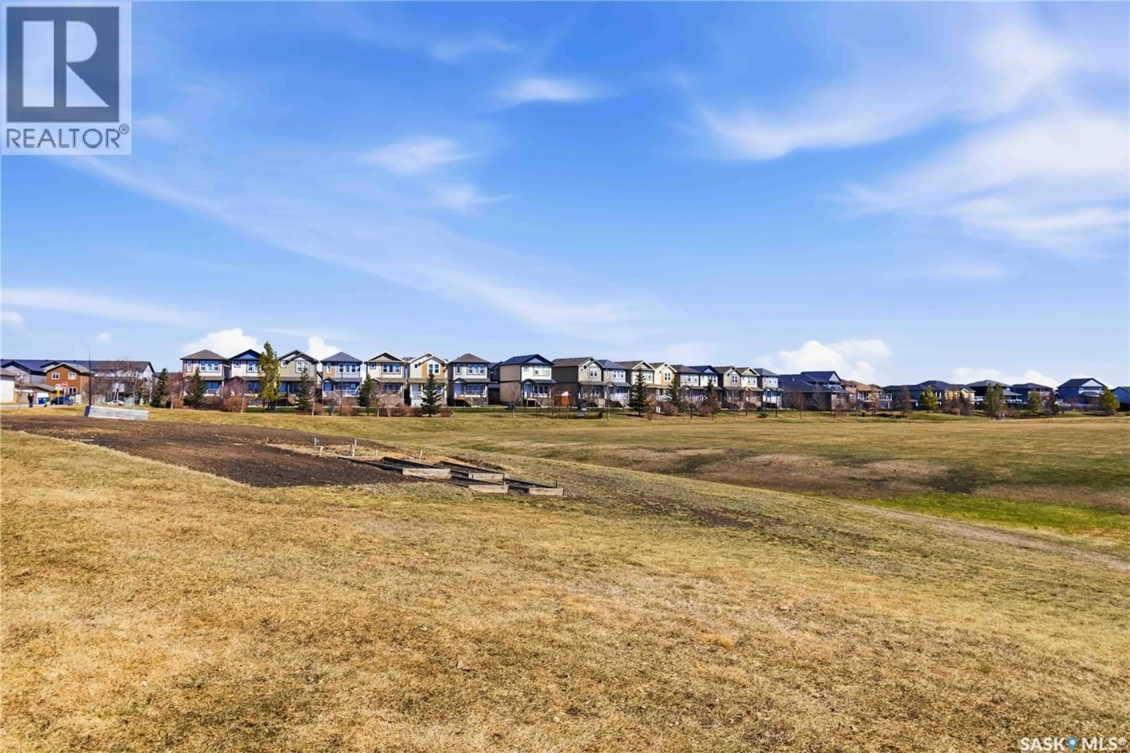 A pic from outside/outdoor area/front of a property/back of a property/a pic from drone, water/lake/river/ocean view for 315 - 217 HAMPTON CIRCLE, Saskatoon Saskatchewan S7R0J7