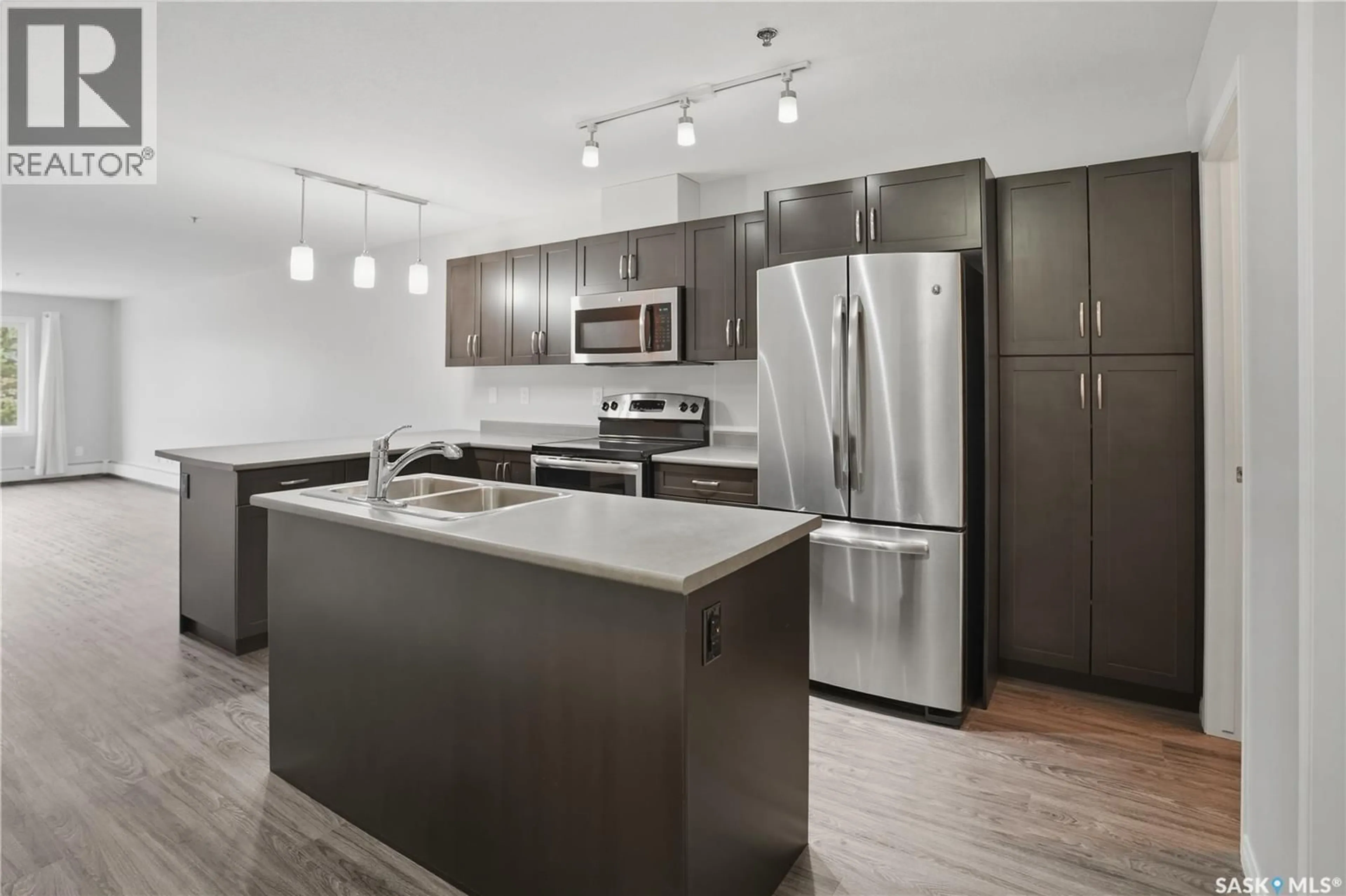 Open concept kitchen, unknown for 201 - 2452 KILLDEER DRIVE, North Battleford Saskatchewan S9A3T5