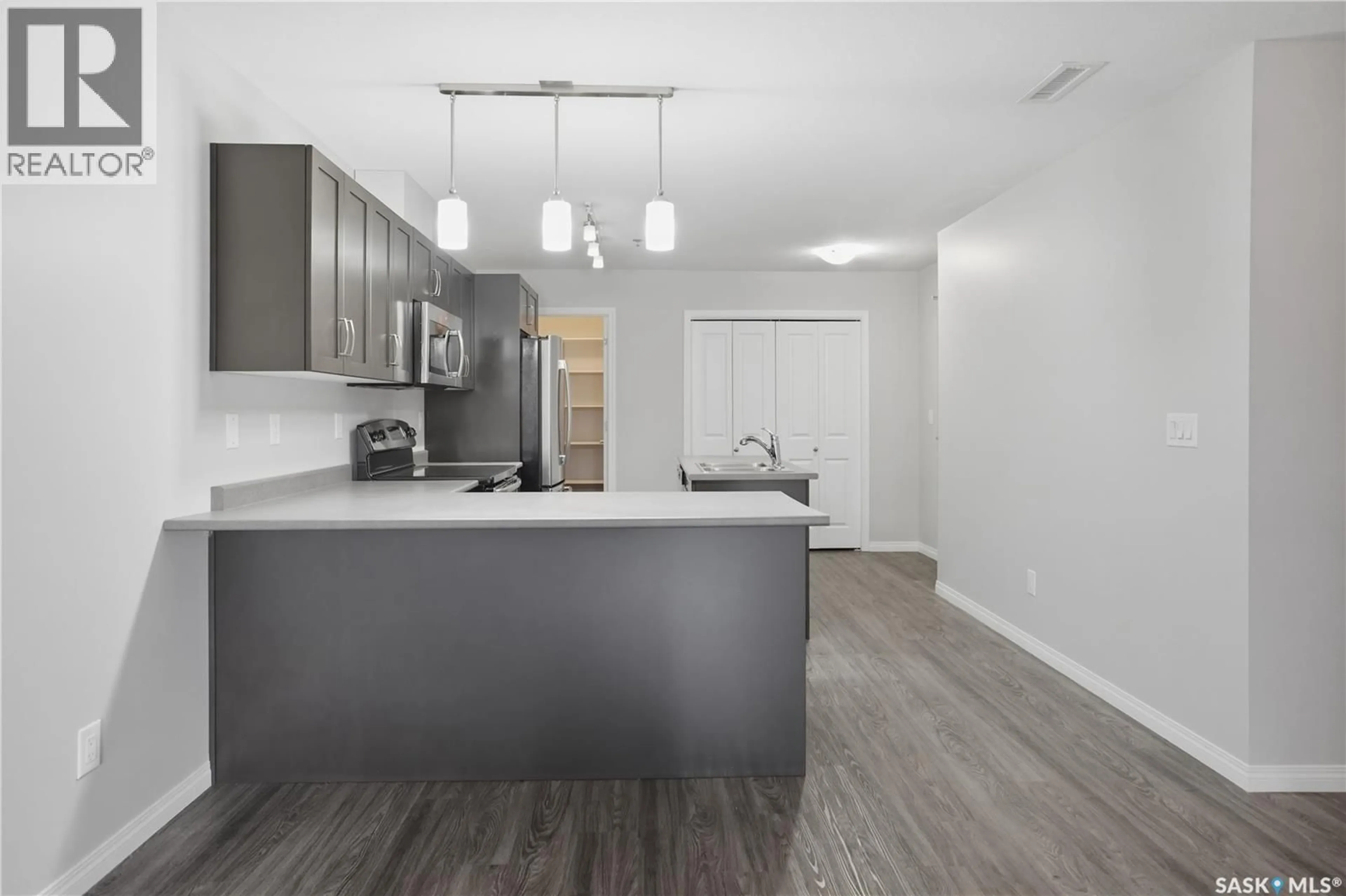 Open concept kitchen, unknown for 201 - 2452 KILLDEER DRIVE, North Battleford Saskatchewan S9A3T5