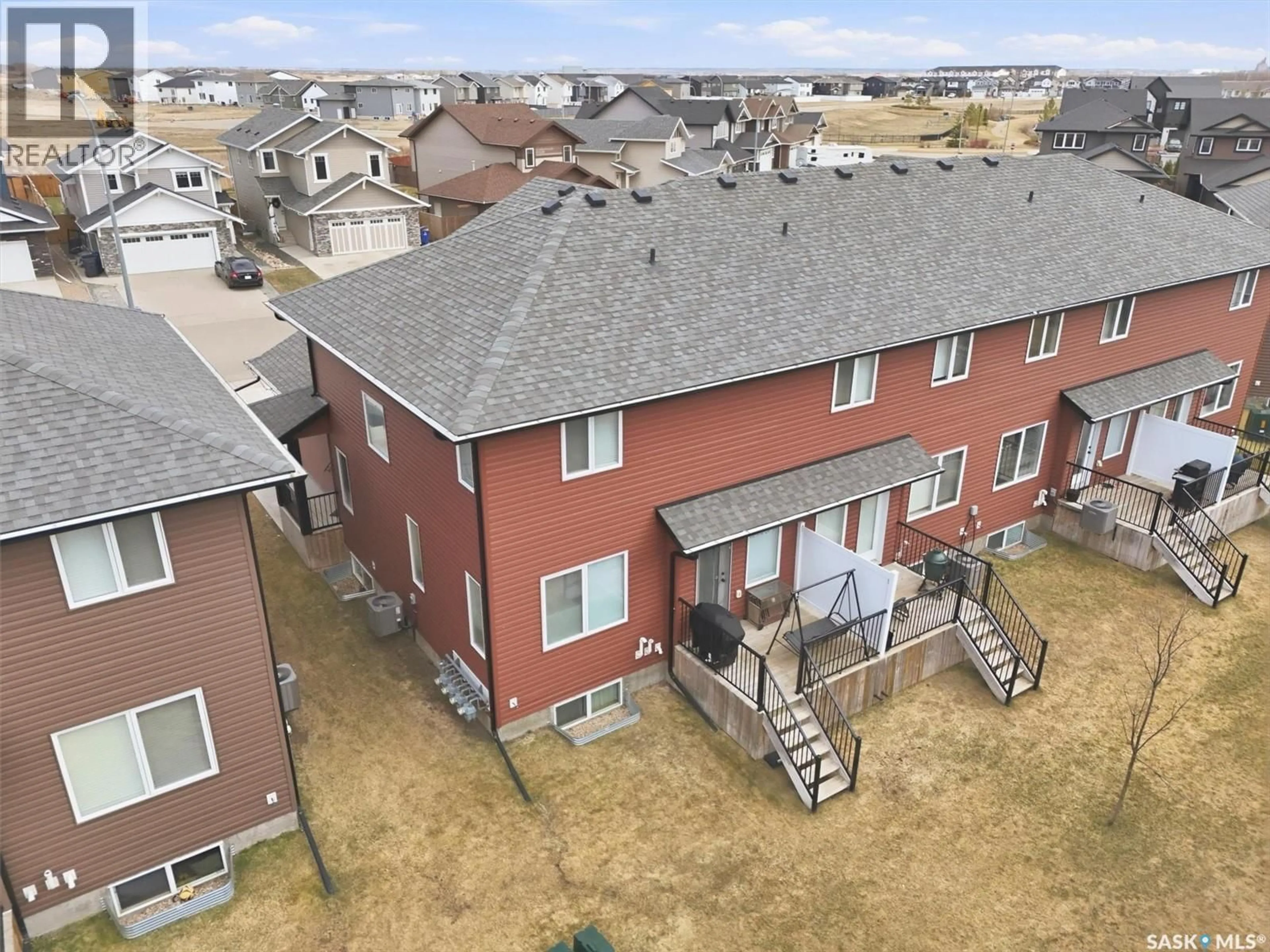 A pic from outside/outdoor area/front of a property/back of a property/a pic from drone, unknown for 338 BASSETT ROAD, Martensville Saskatchewan S0K2T1
