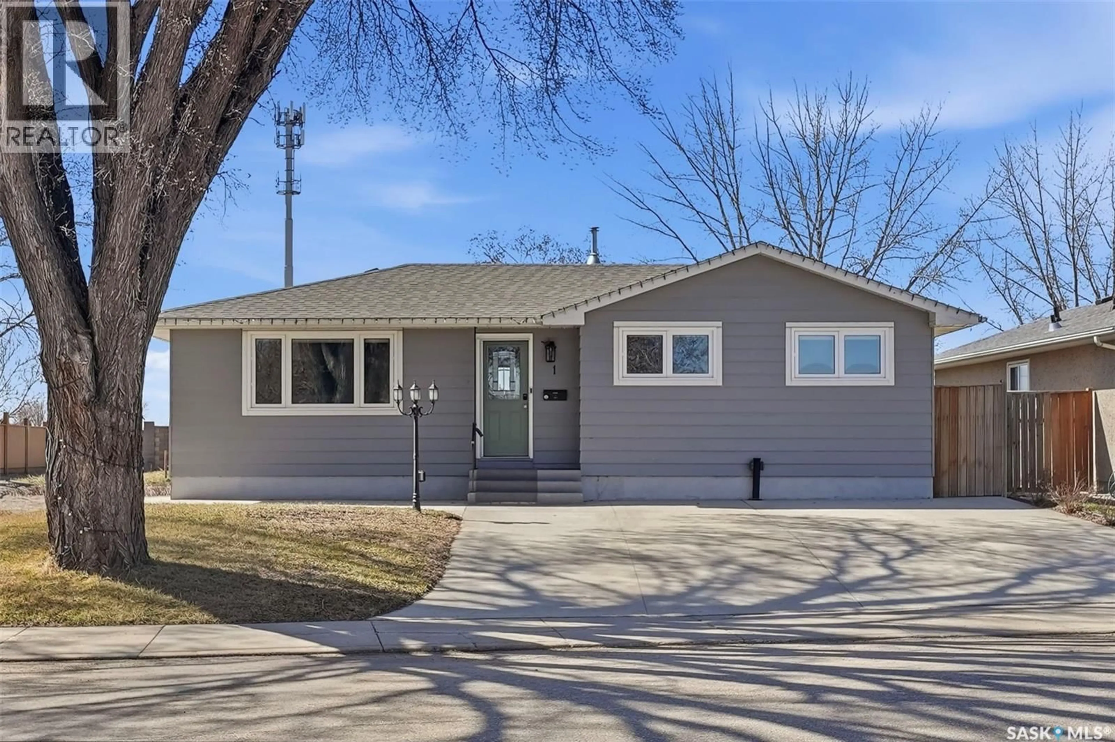 Home with vinyl exterior material, street for 1 RUPERT DRIVE, Saskatoon Saskatchewan S7K1B1