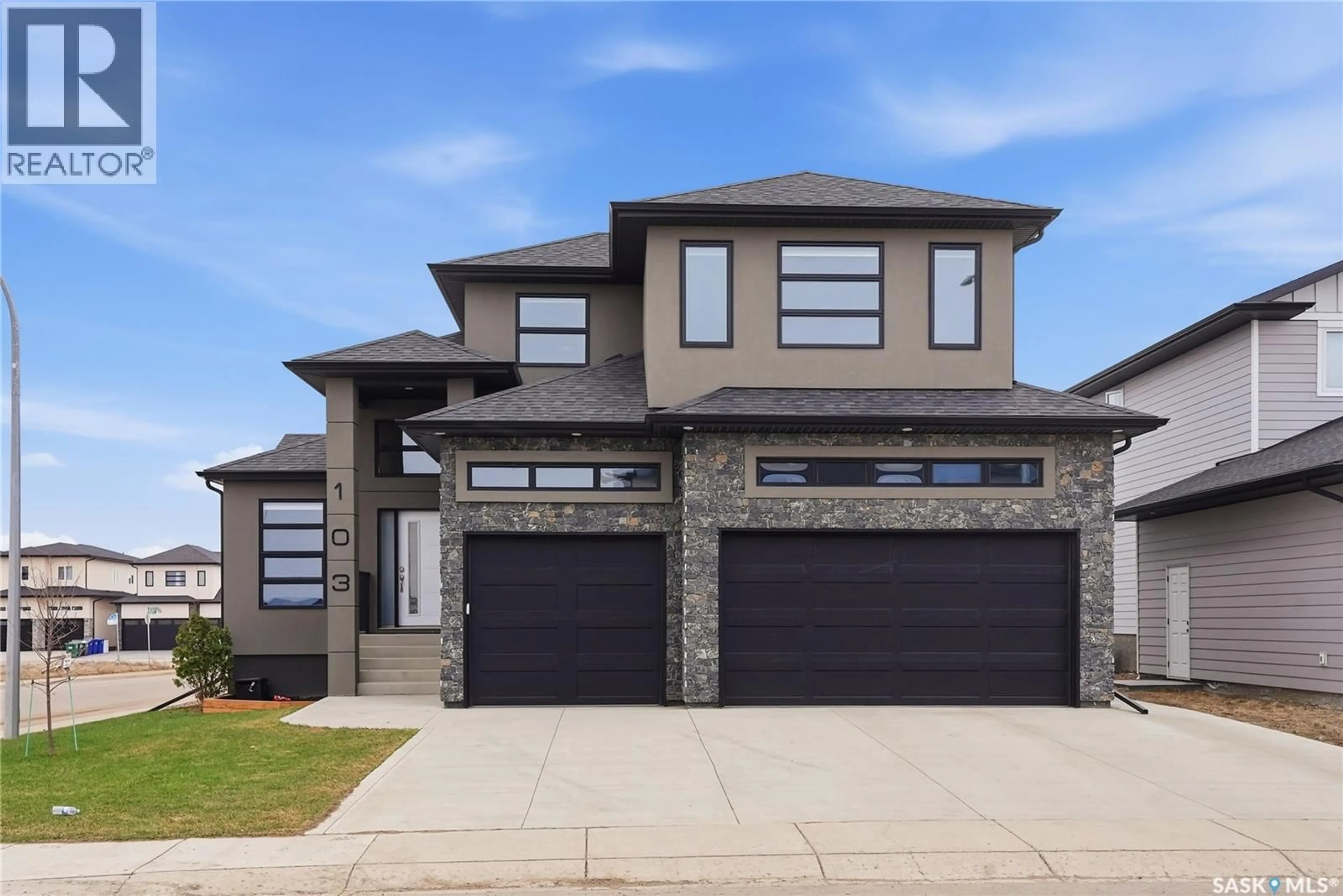Home with brick exterior material, street for 103 FLYNN MANOR, Saskatoon Saskatchewan S7V0Z4