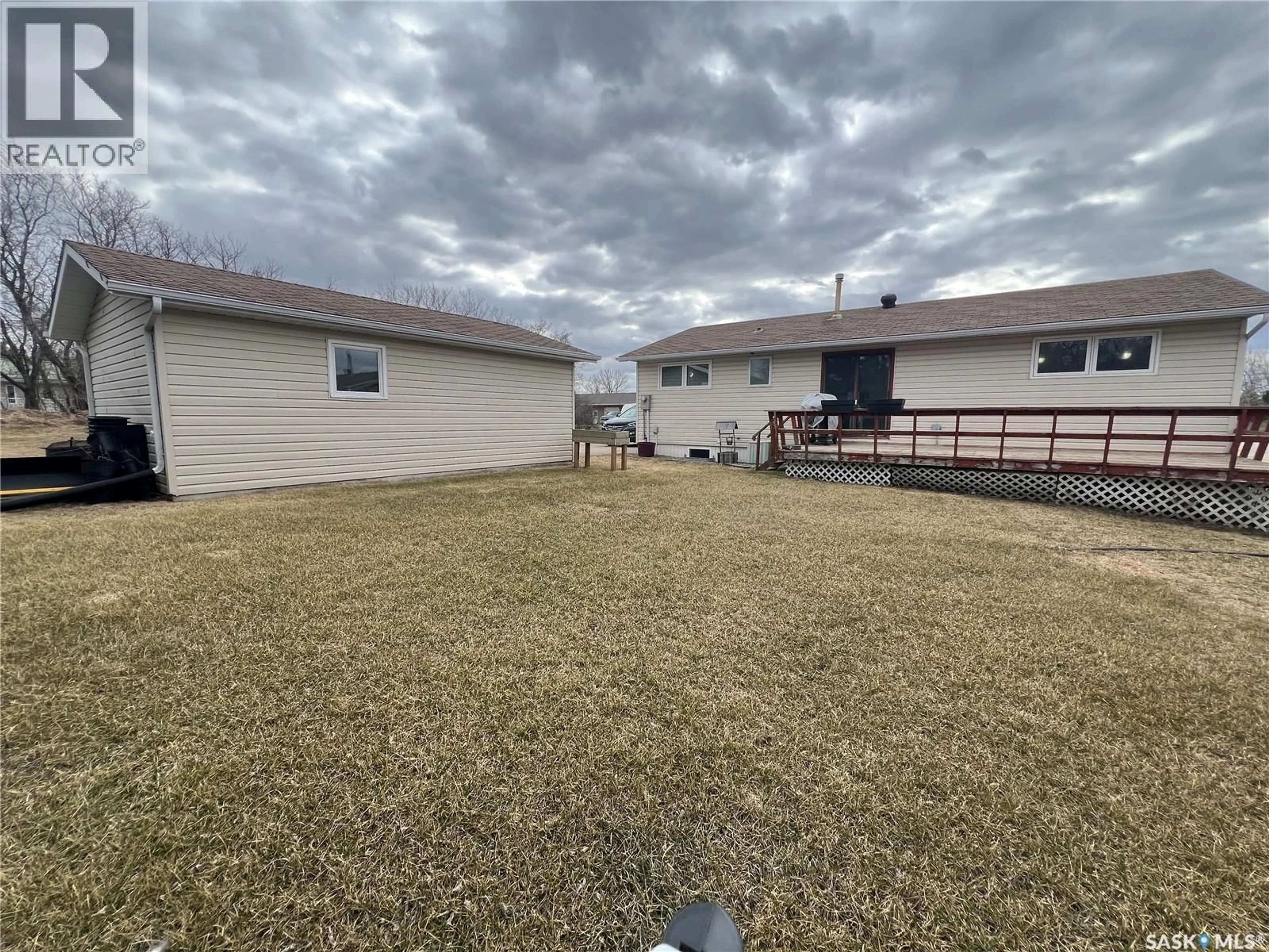 A pic from outside/outdoor area/front of a property/back of a property/a pic from drone, water/lake/river/ocean view for 901 THOMPSON STREET, Whitewood Saskatchewan S0G5C0