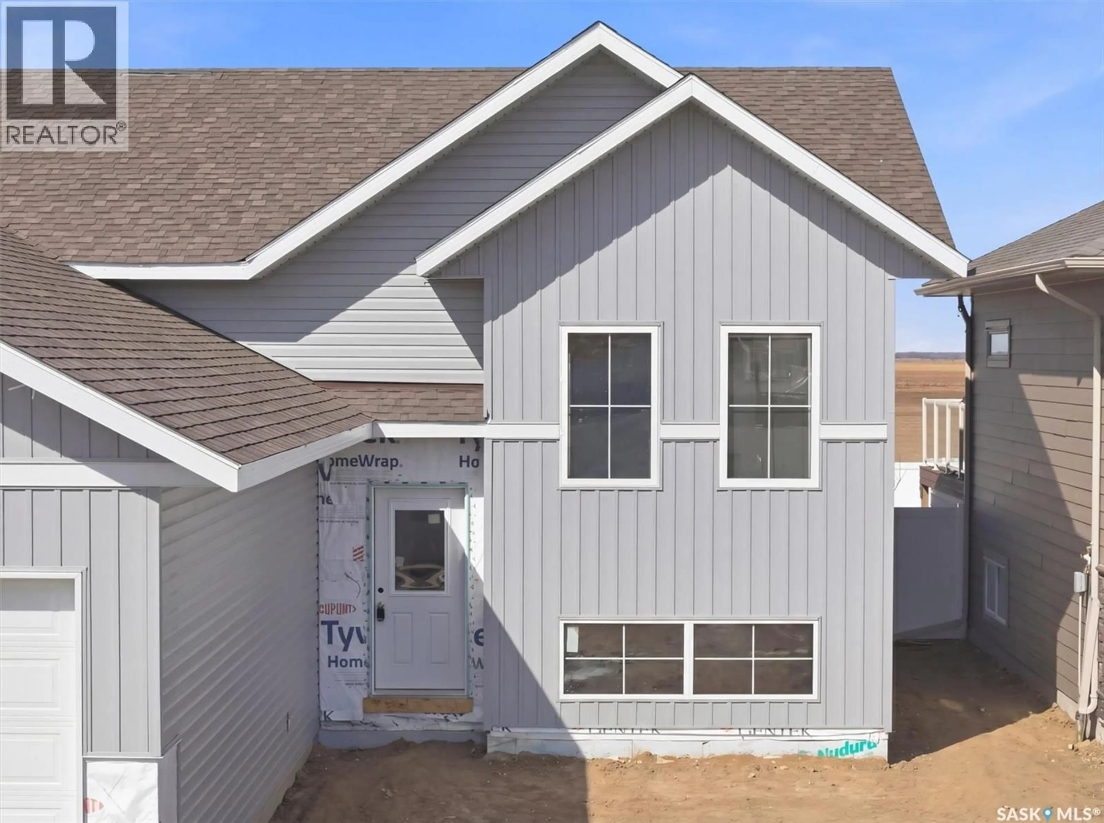 Home with vinyl exterior material, street for 268 PRAIRIE DAWN DRIVE, Dundurn Saskatchewan S0K1K1