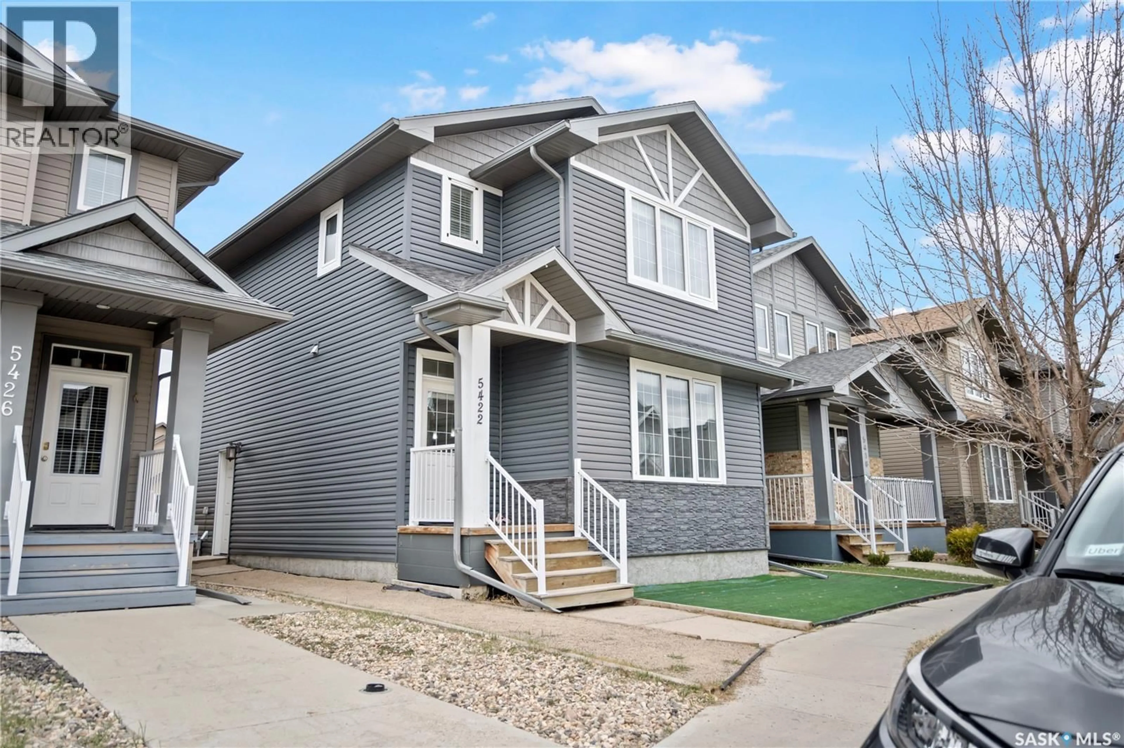 Home with vinyl exterior material, street for 5422 WHEREATT ROAD, Regina Saskatchewan S4W0K4