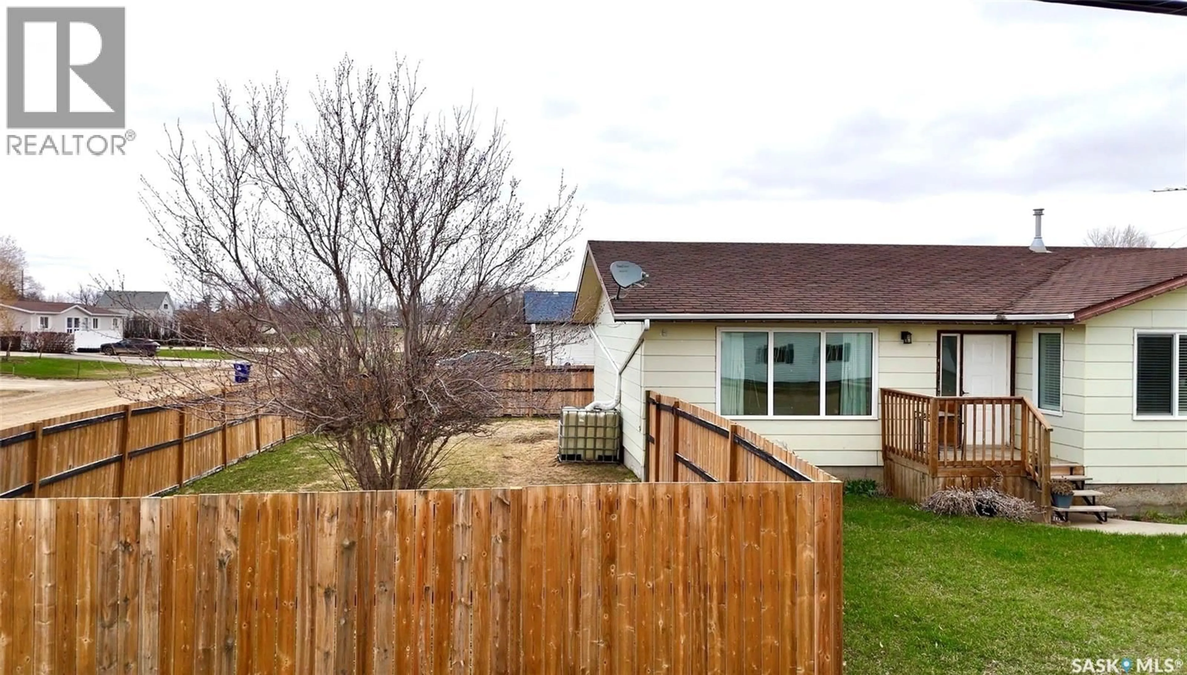 A pic from outside/outdoor area/front of a property/back of a property/a pic from drone, mountain view for 701 1ST STREET, Hanley Saskatchewan S0G2E0