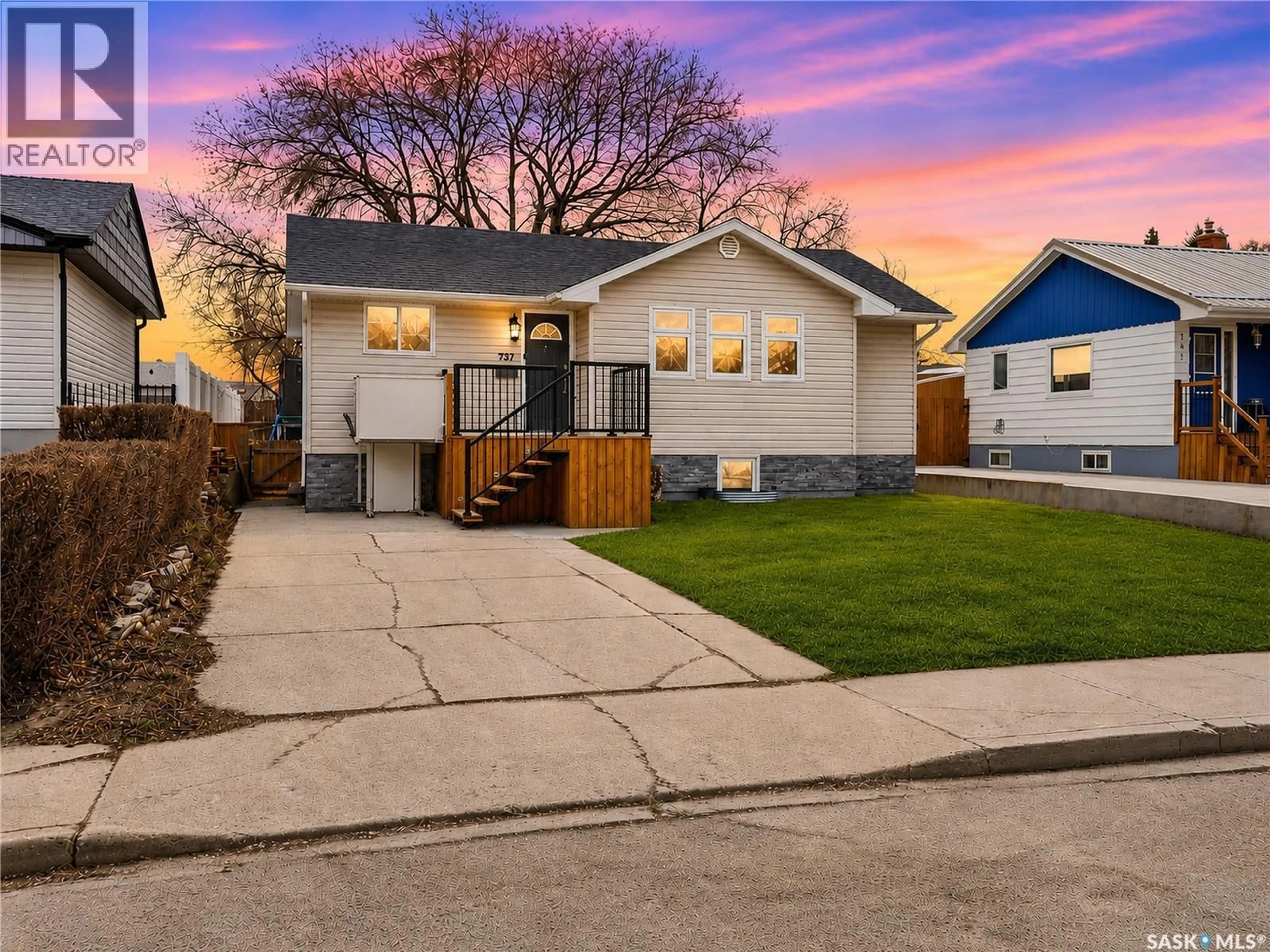 Home with vinyl exterior material, street for 737 VAUGHAN STREET, Moose Jaw Saskatchewan S6H5N4