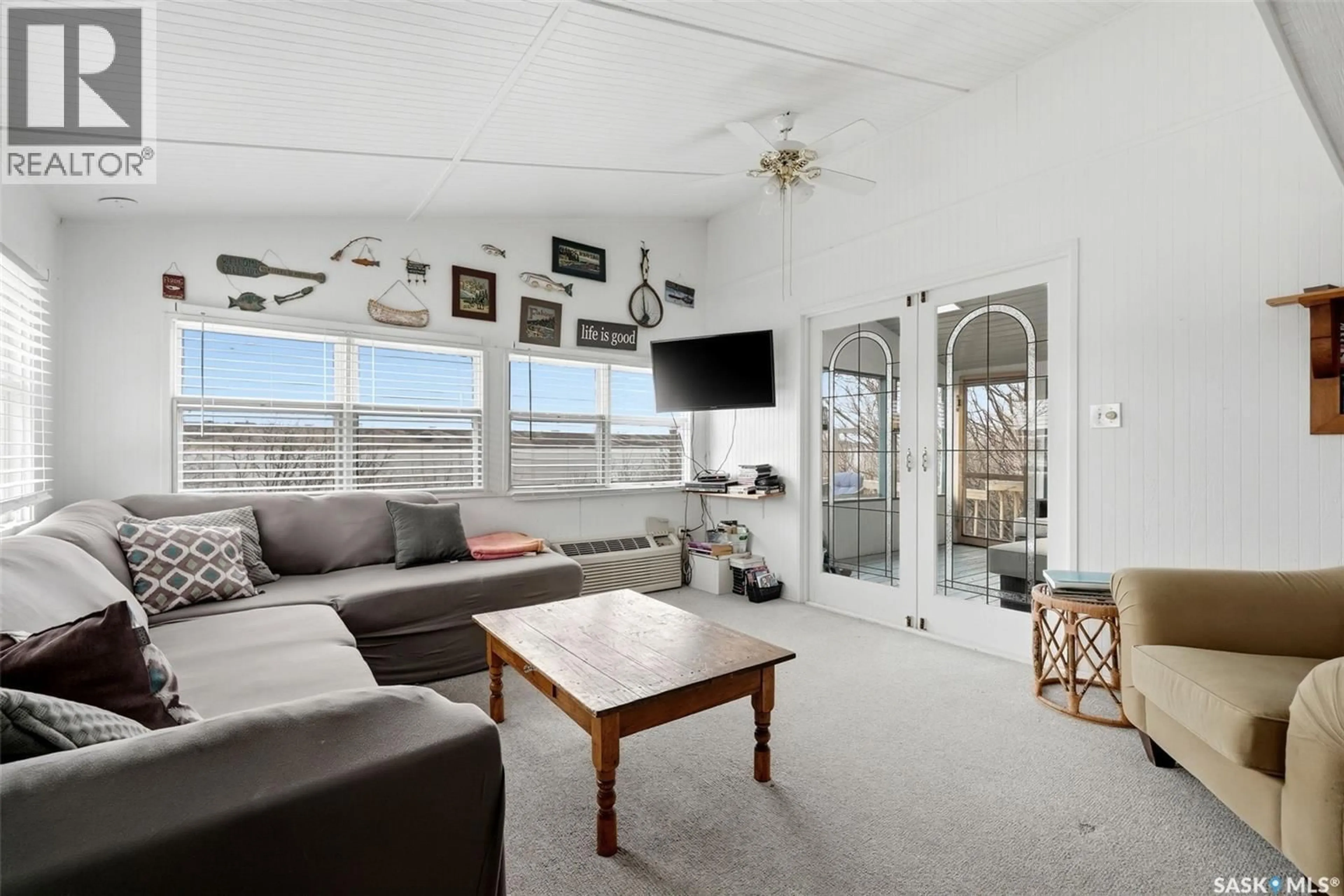 Living room with furniture, unknown for Lumsden Beach Saskatchewan S4S4C0