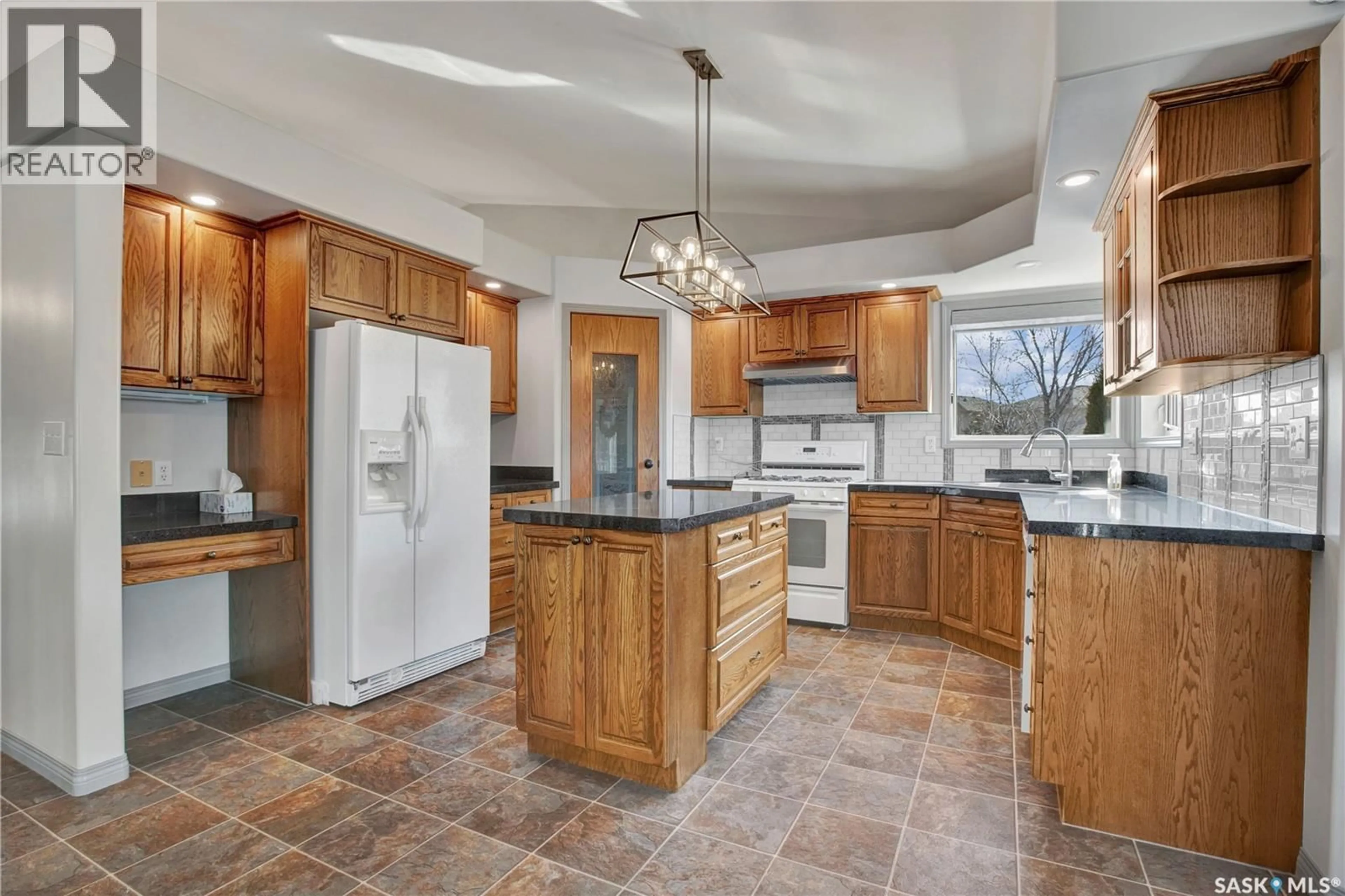 Open concept kitchen, ceramic/tile floor for 114 WOODS COURT, Saskatoon Saskatchewan S7N4M2