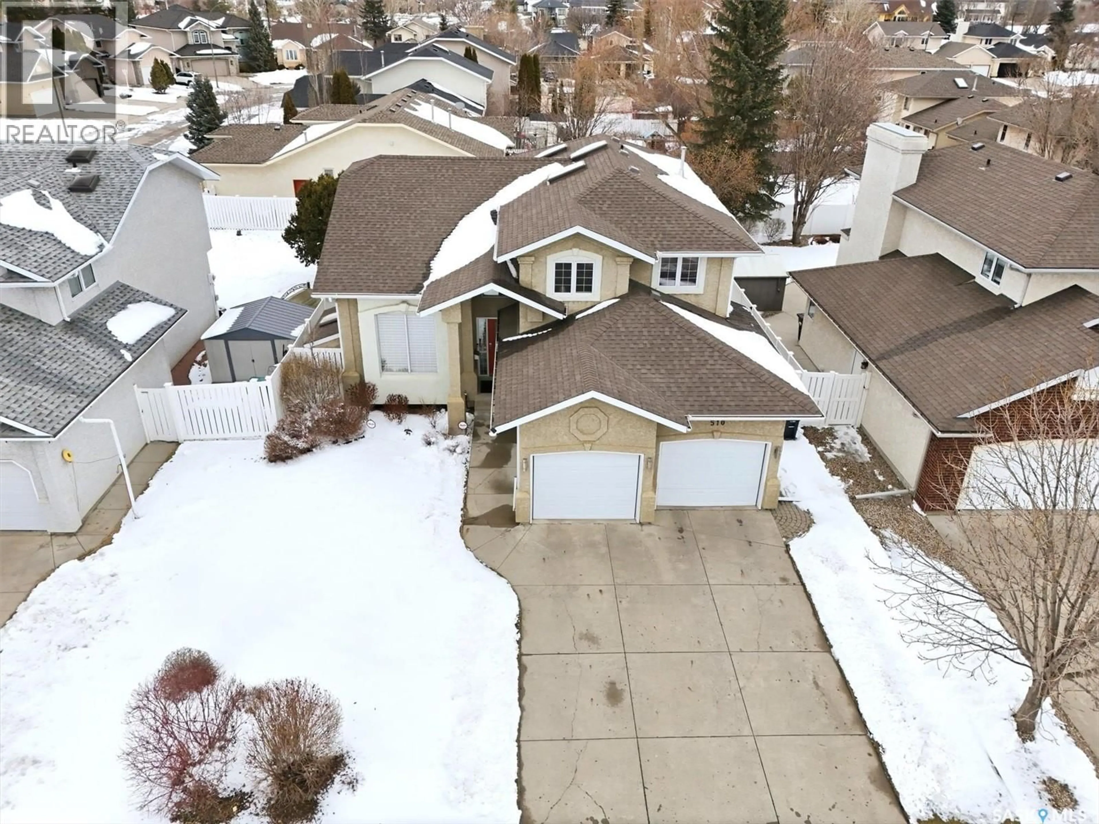 A pic from outside/outdoor area/front of a property/back of a property/a pic from drone, street for 510 EASTMAN COVE, Saskatoon Saskatchewan S7N4K9