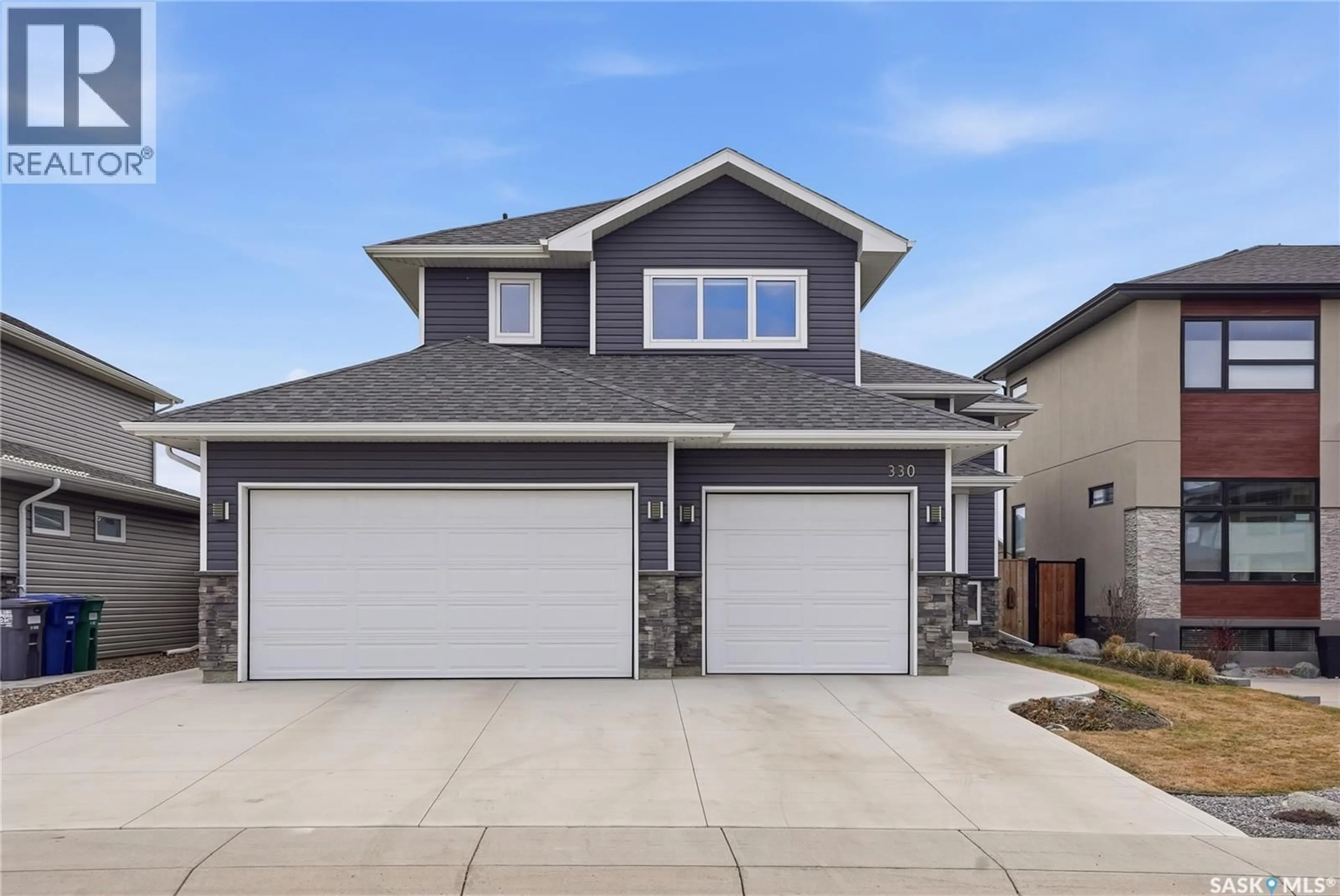 Home with vinyl exterior material, street for 330 HAMM WAY, Saskatoon Saskatchewan S7V0W3