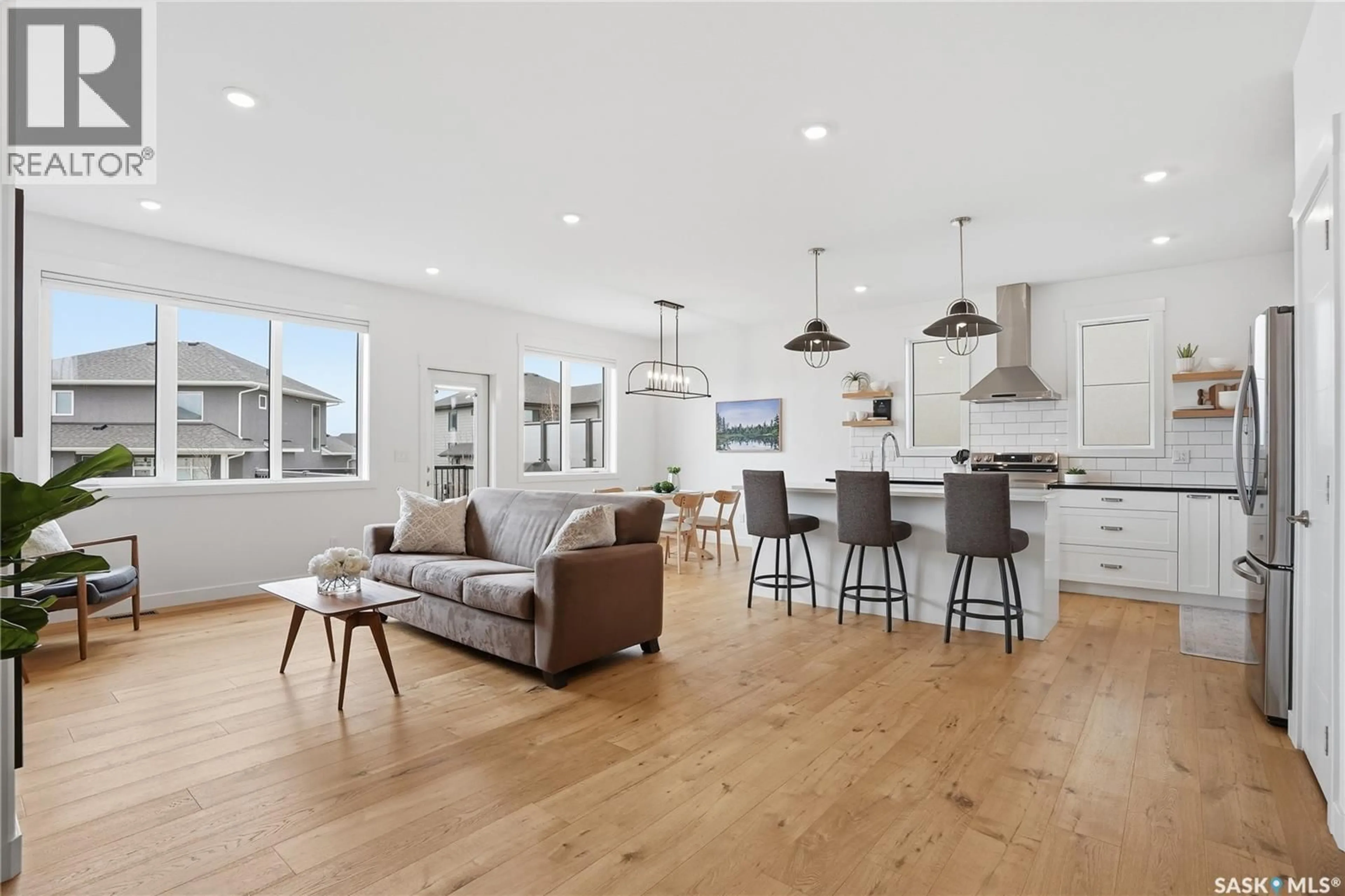 Open concept kitchen, wood/laminate floor for 330 HAMM WAY, Saskatoon Saskatchewan S7V0W3