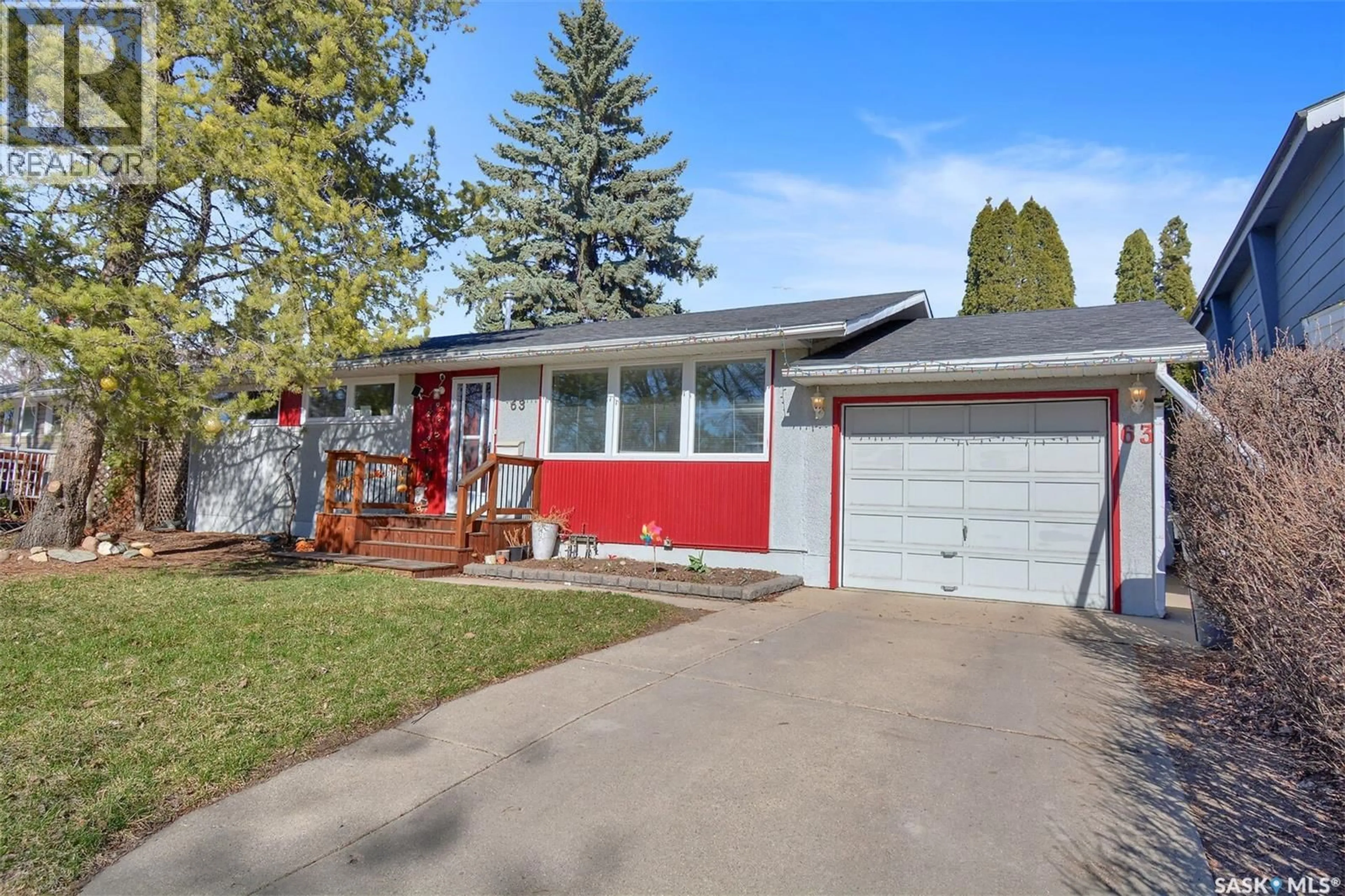 Home with vinyl exterior material, street for 63 SPINKS DRIVE, Saskatoon Saskatchewan S7H3X1