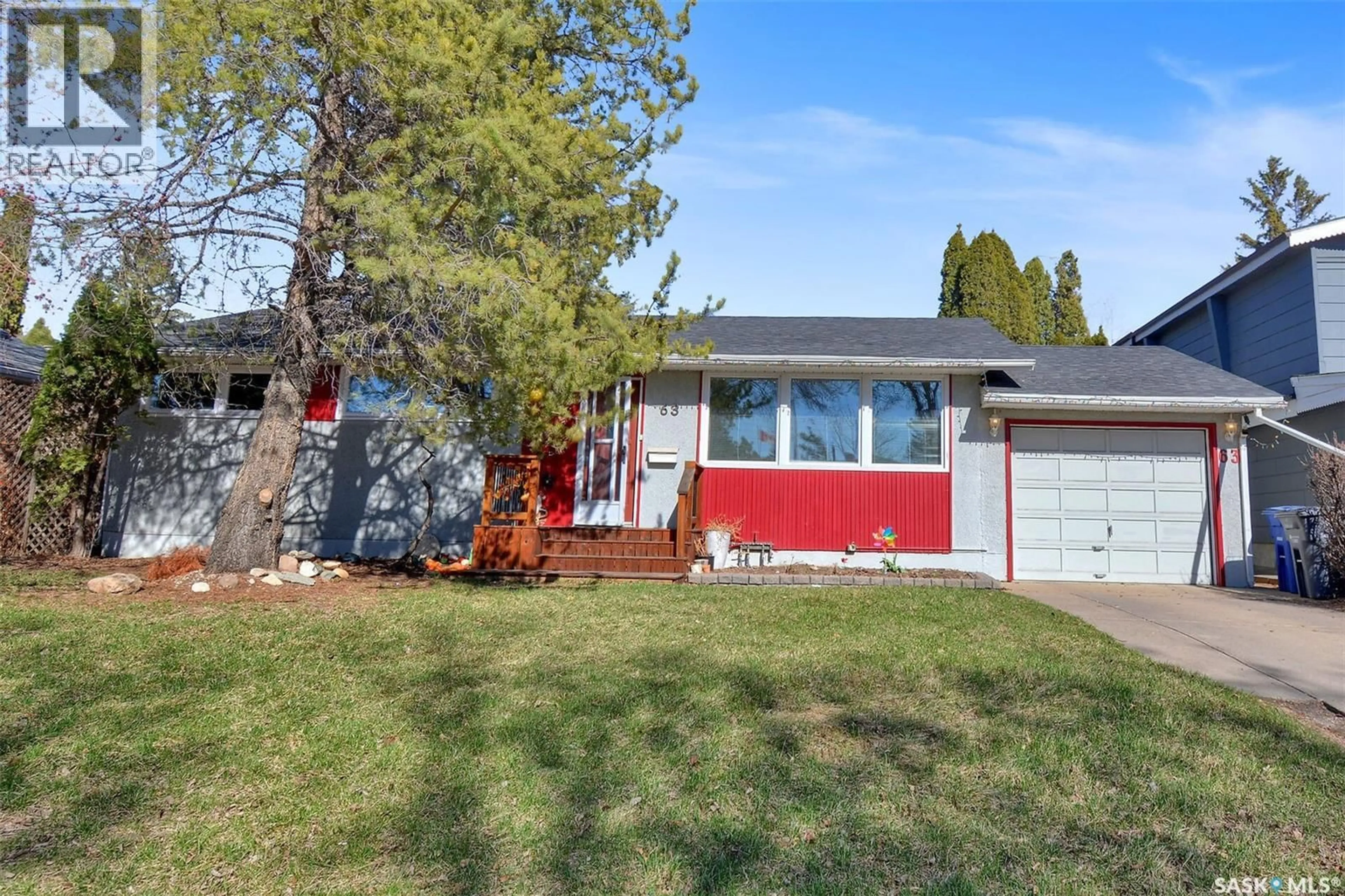 Home with vinyl exterior material, street for 63 SPINKS DRIVE, Saskatoon Saskatchewan S7H3X1