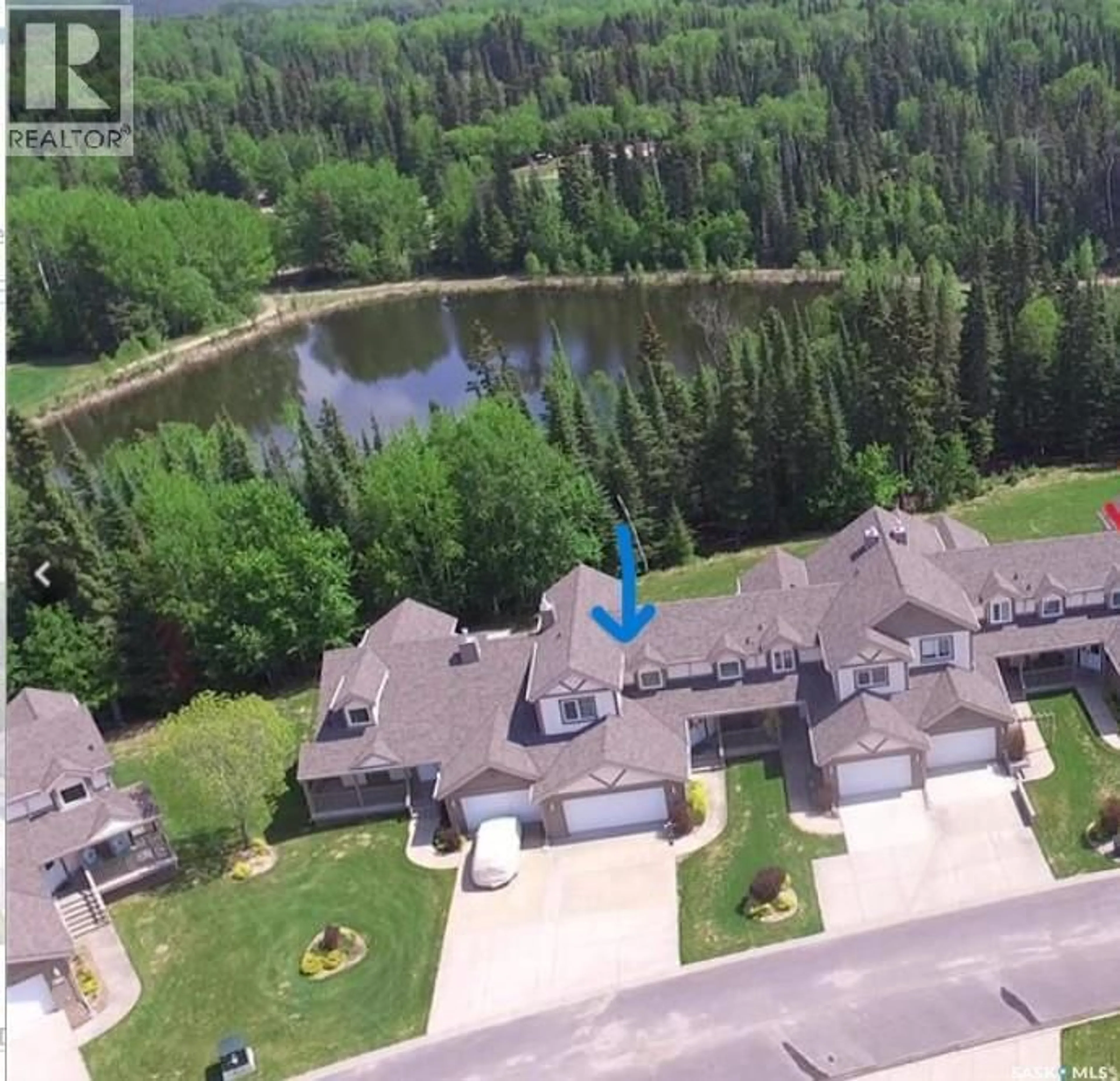A pic from outside/outdoor area/front of a property/back of a property/a pic from drone, water/lake/river/ocean view for 17 EAGLE VIEW WAY, Elk Ridge Saskatchewan S0J0N0