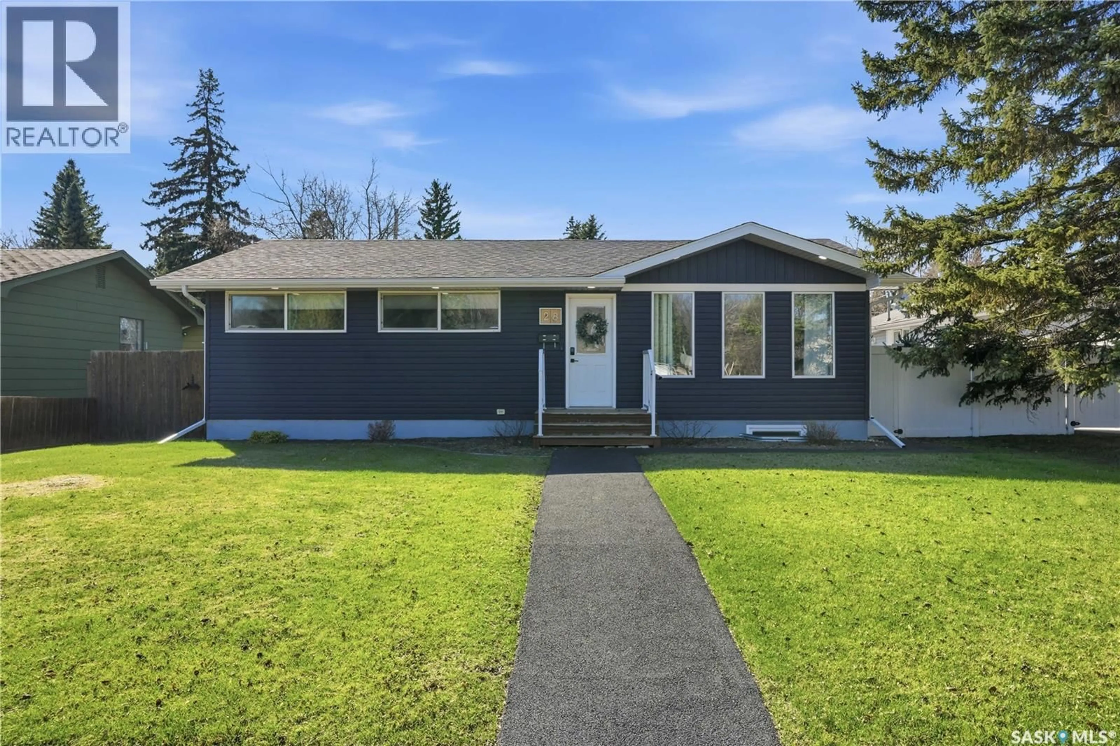 Home with vinyl exterior material, street for 28 OLIVER CRESCENT, Saskatoon Saskatchewan S7H3C8