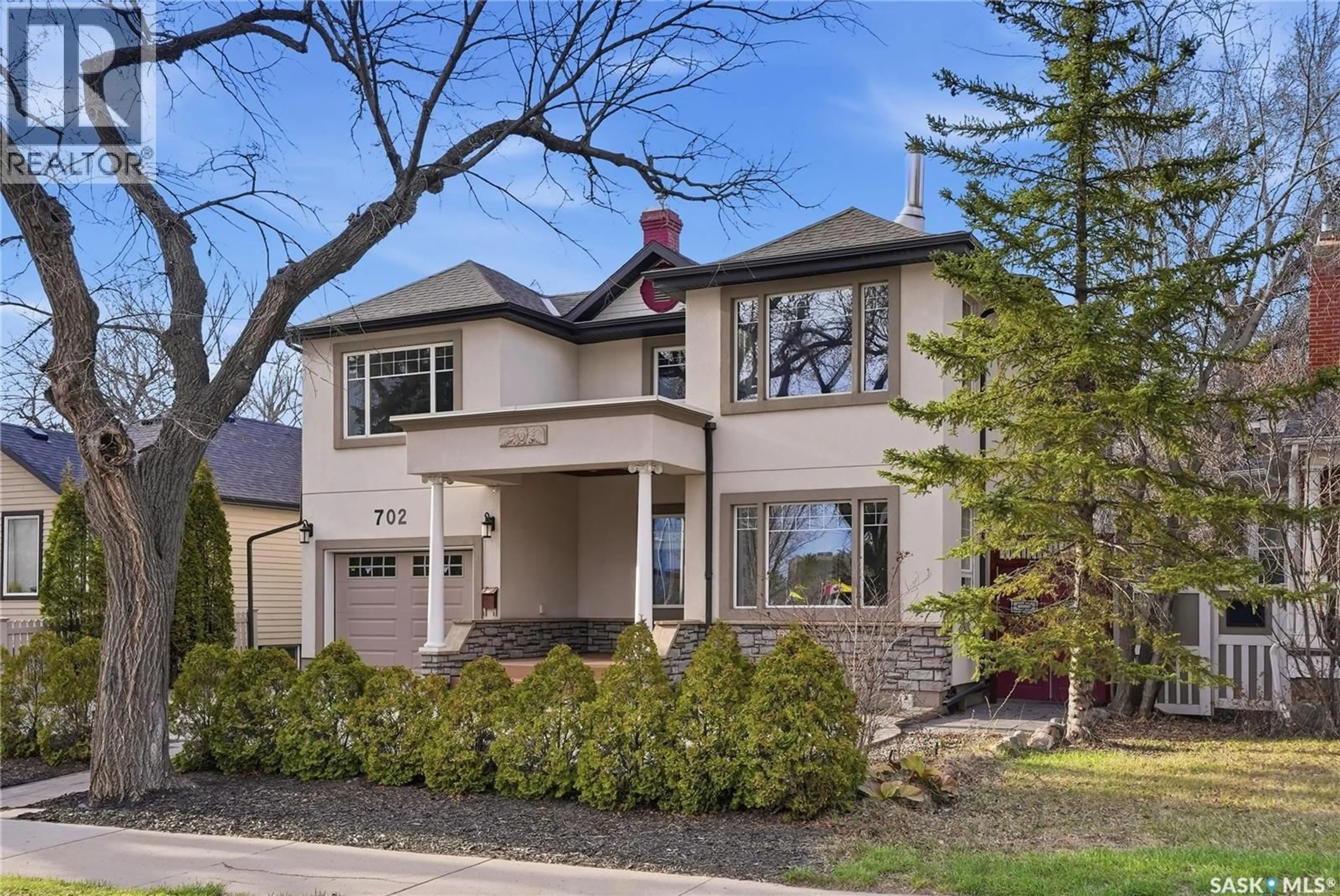 Home with brick exterior material, street for 702 QUEEN STREET, Saskatoon Saskatchewan S7K0M9