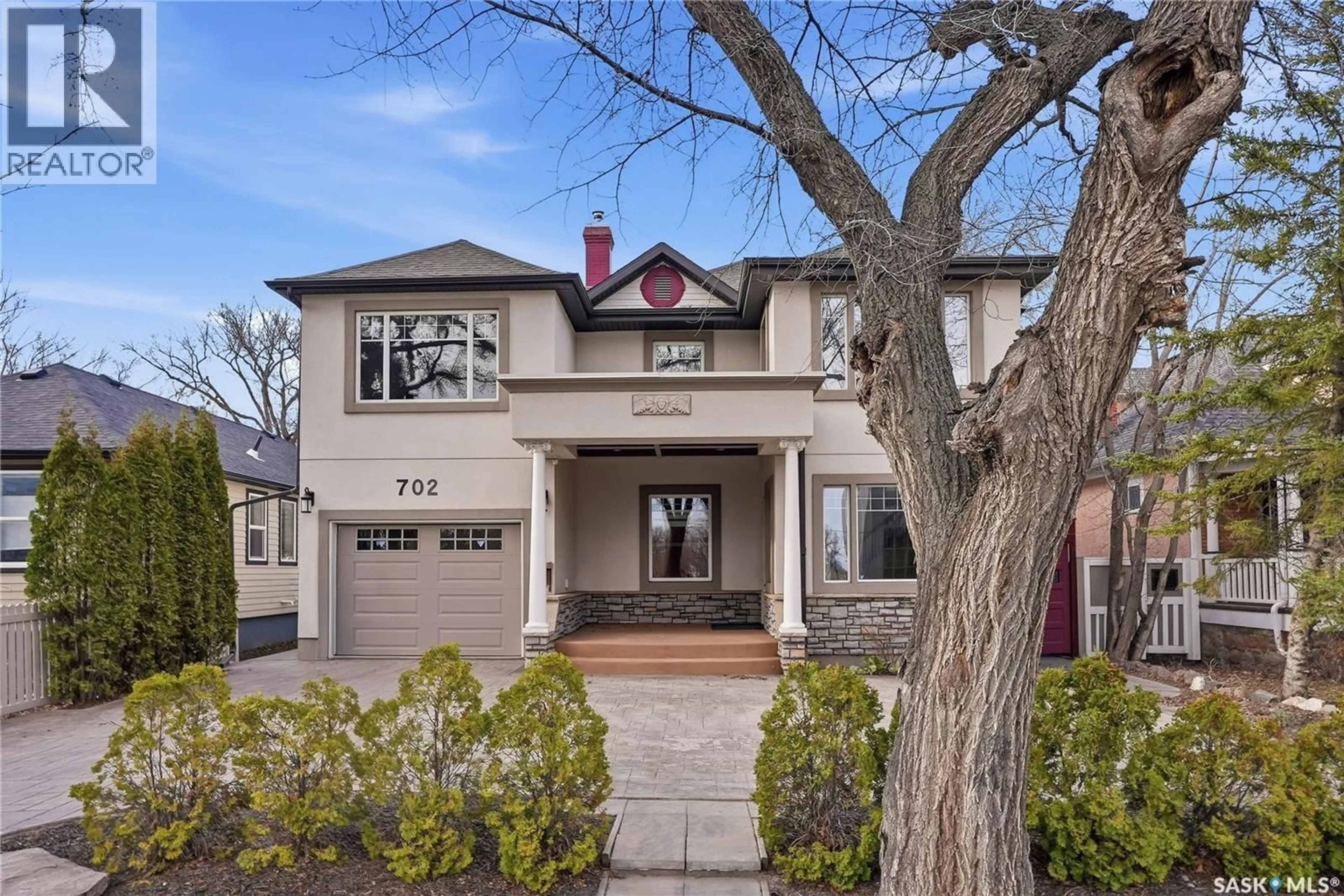 Home with brick exterior material, street for 702 QUEEN STREET, Saskatoon Saskatchewan S7K0M9