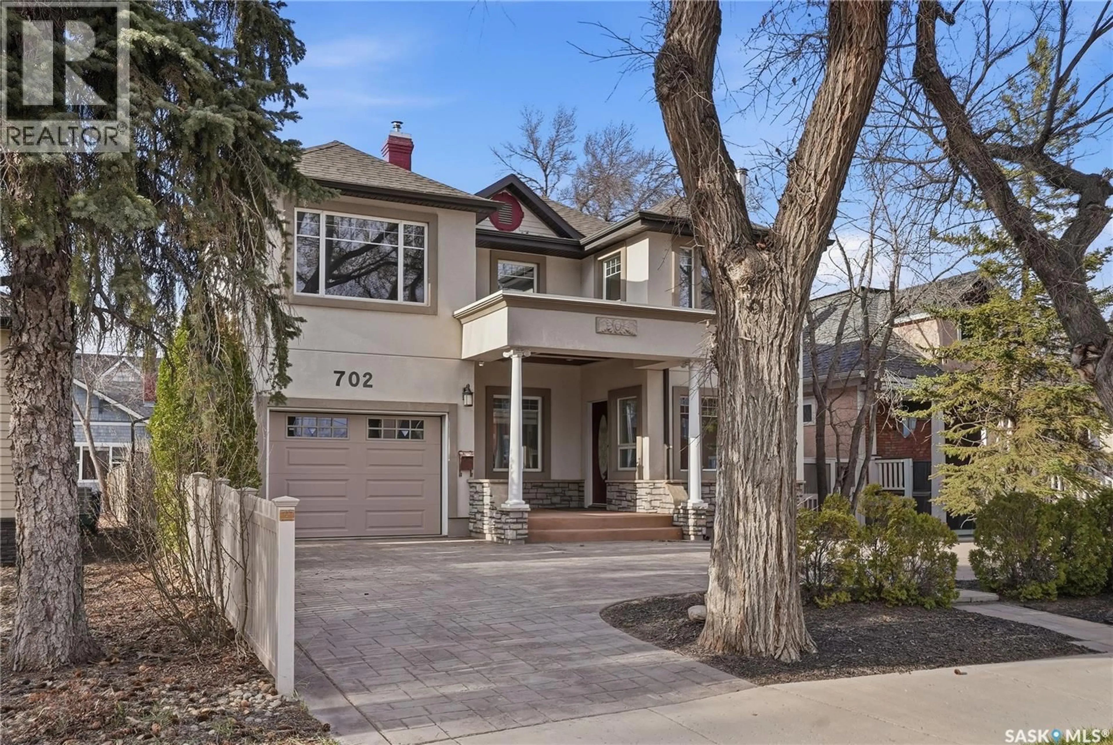 Home with brick exterior material, street for 702 QUEEN STREET, Saskatoon Saskatchewan S7K0M9