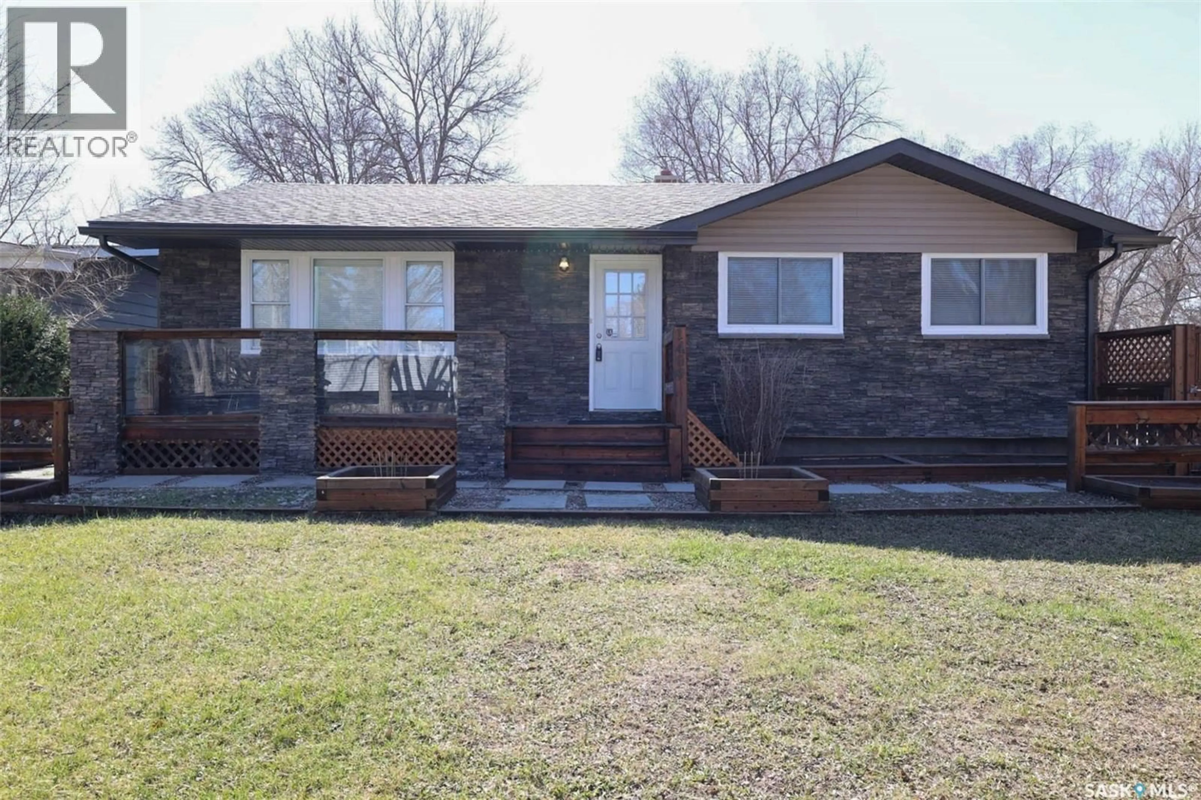 Home with brick exterior material, street for 1409 SHANNON ROAD, Regina Saskatchewan S4S5L4