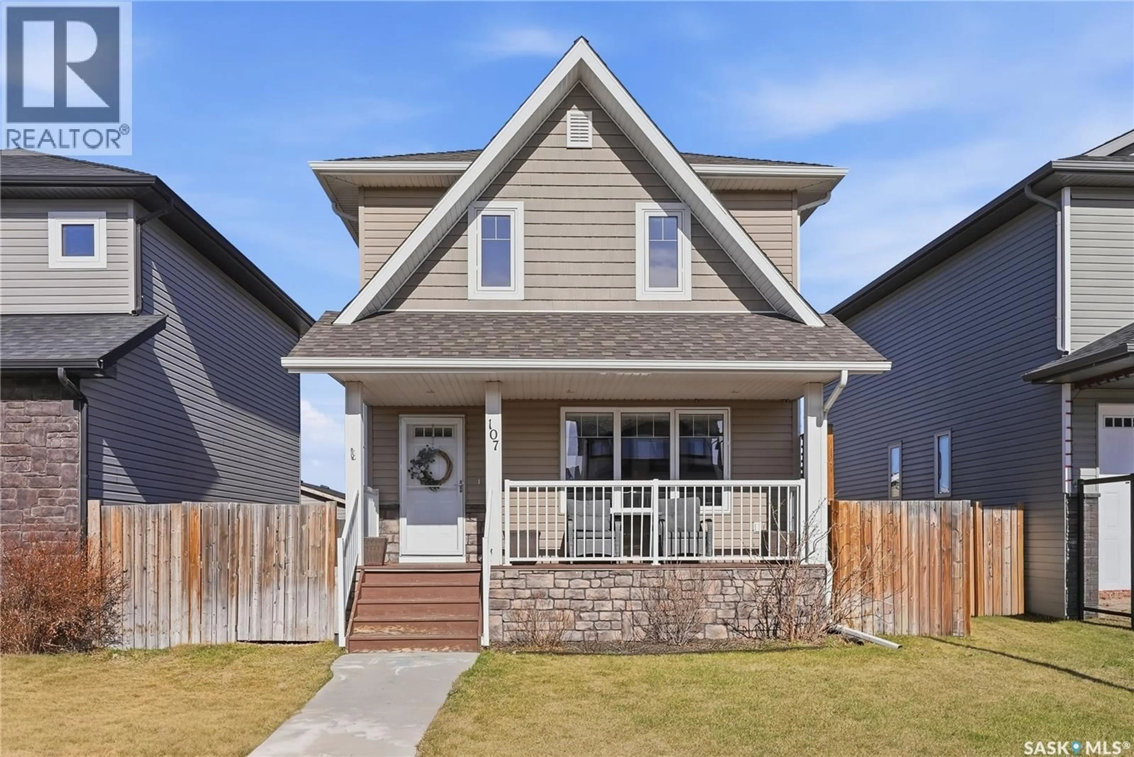 Home with vinyl exterior material, street for 107 LANGLOIS WAY, Saskatoon Saskatchewan S7T0N6