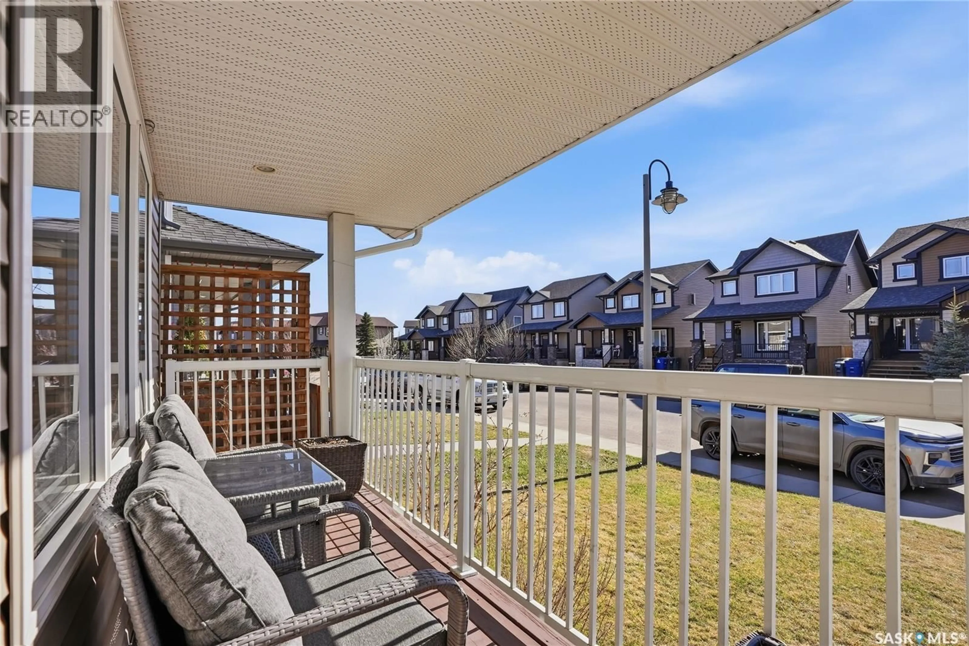 Patio, water/lake/river/ocean view for 107 LANGLOIS WAY, Saskatoon Saskatchewan S7T0N6
