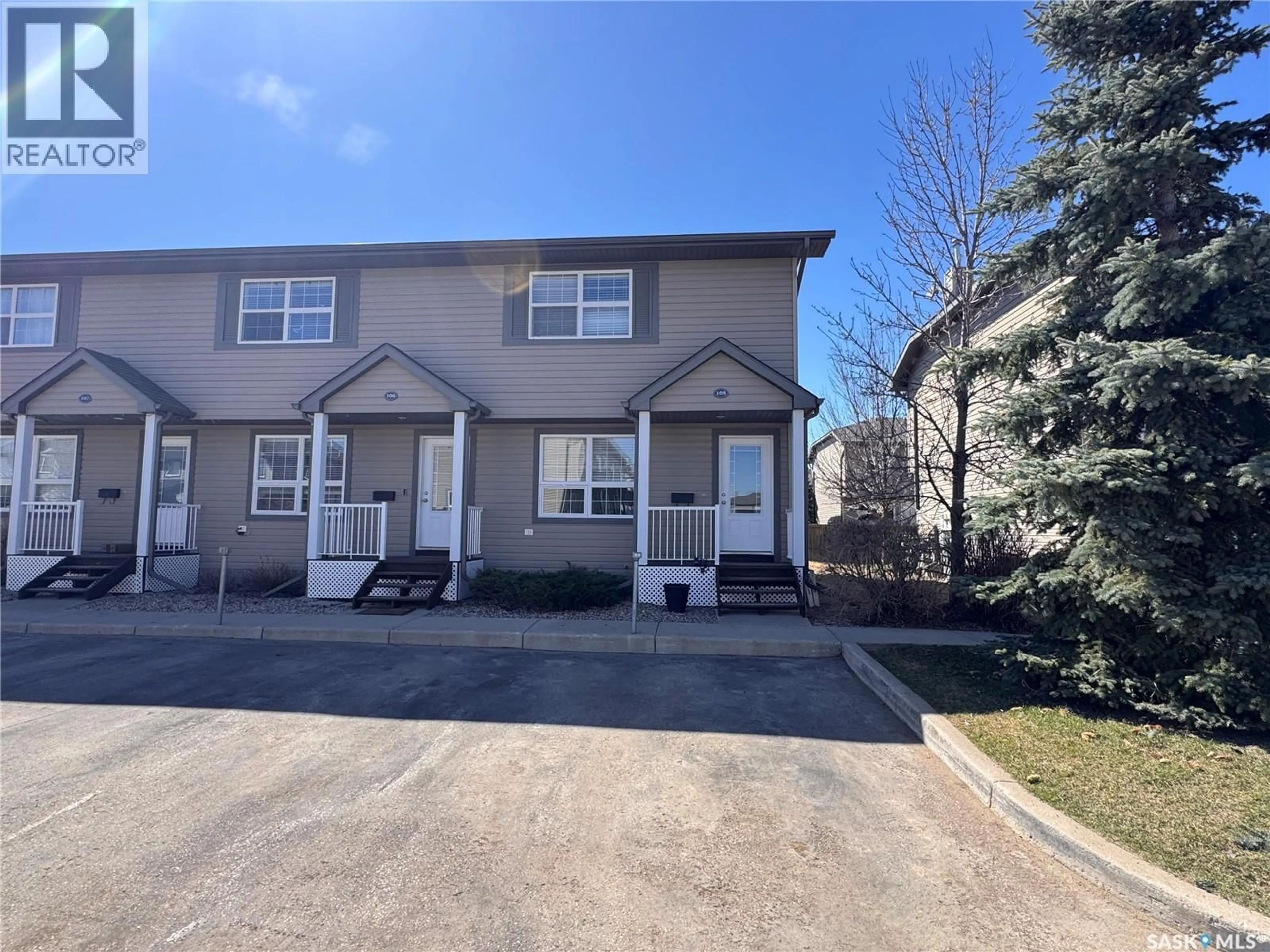 A pic from outside/outdoor area/front of a property/back of a property/a pic from drone, street for 350 - 105 MACCORMACK ROAD, Martensville Saskatchewan S0K0A2