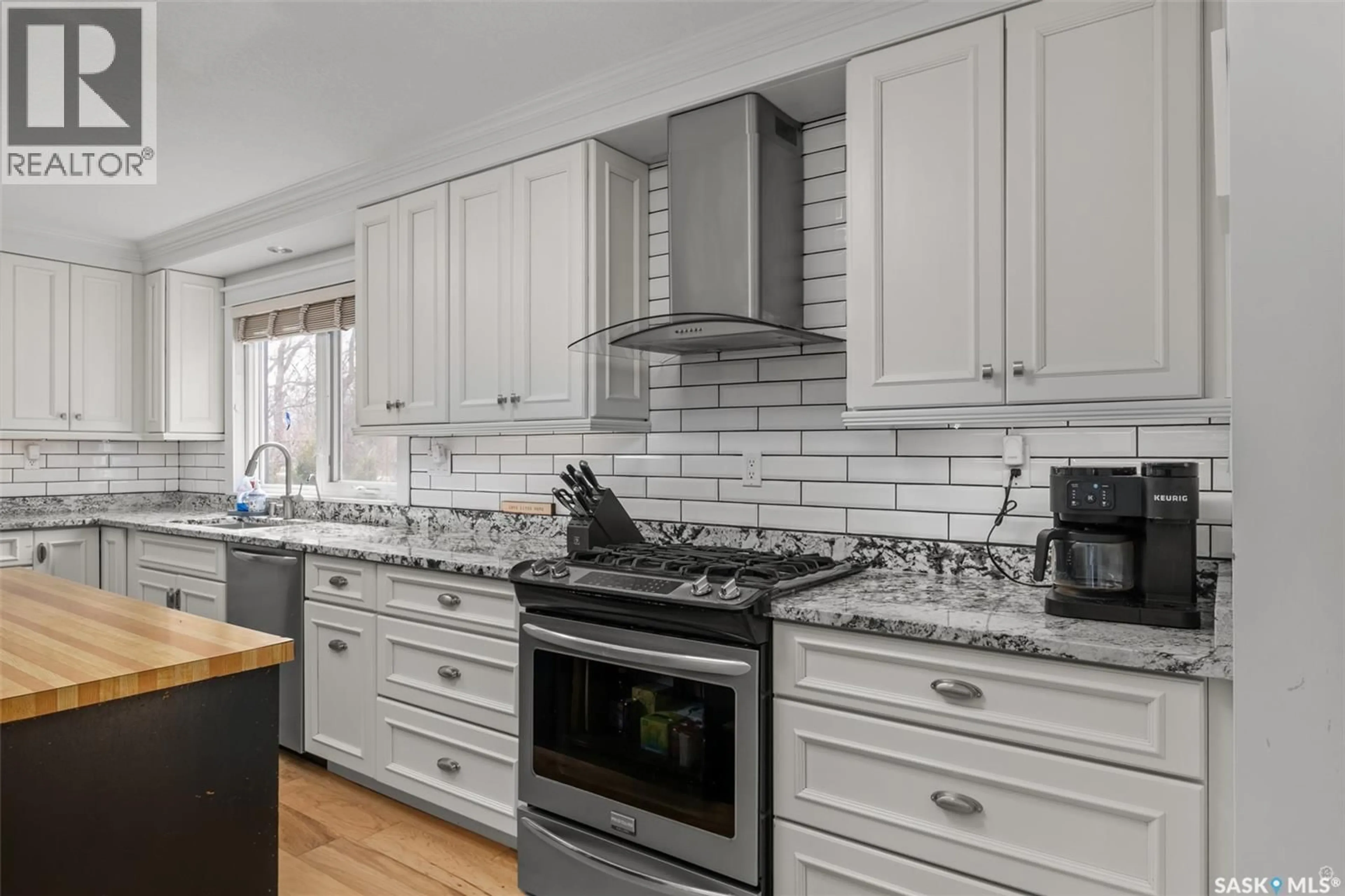 Open concept kitchen, ceramic/tile floor for 1289 GILLMOR CRESCENT, Prince Albert Saskatchewan S6V6A8