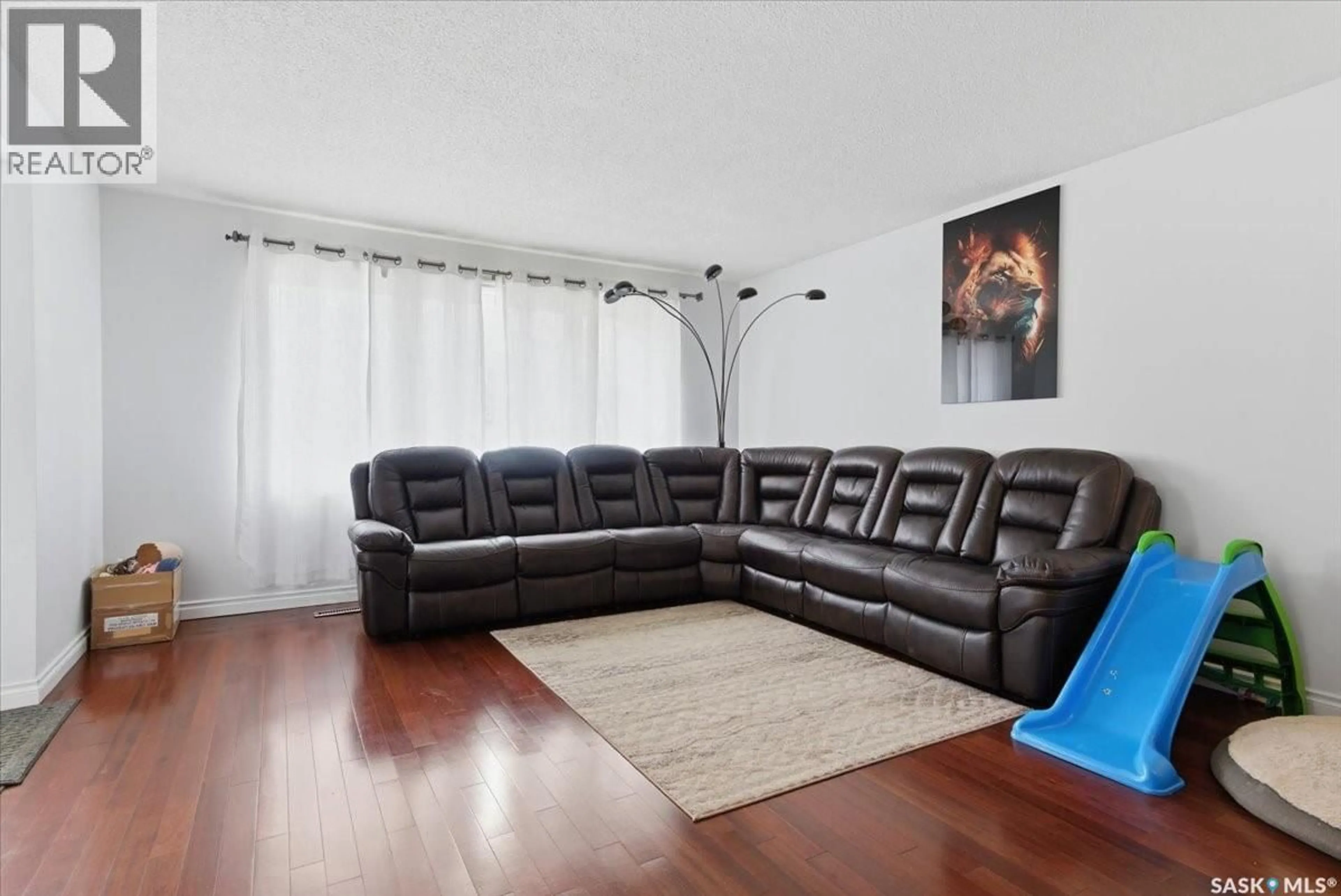 Living room with furniture, unknown for 205 BROAD STREET, Regina Saskatchewan S4R2X7