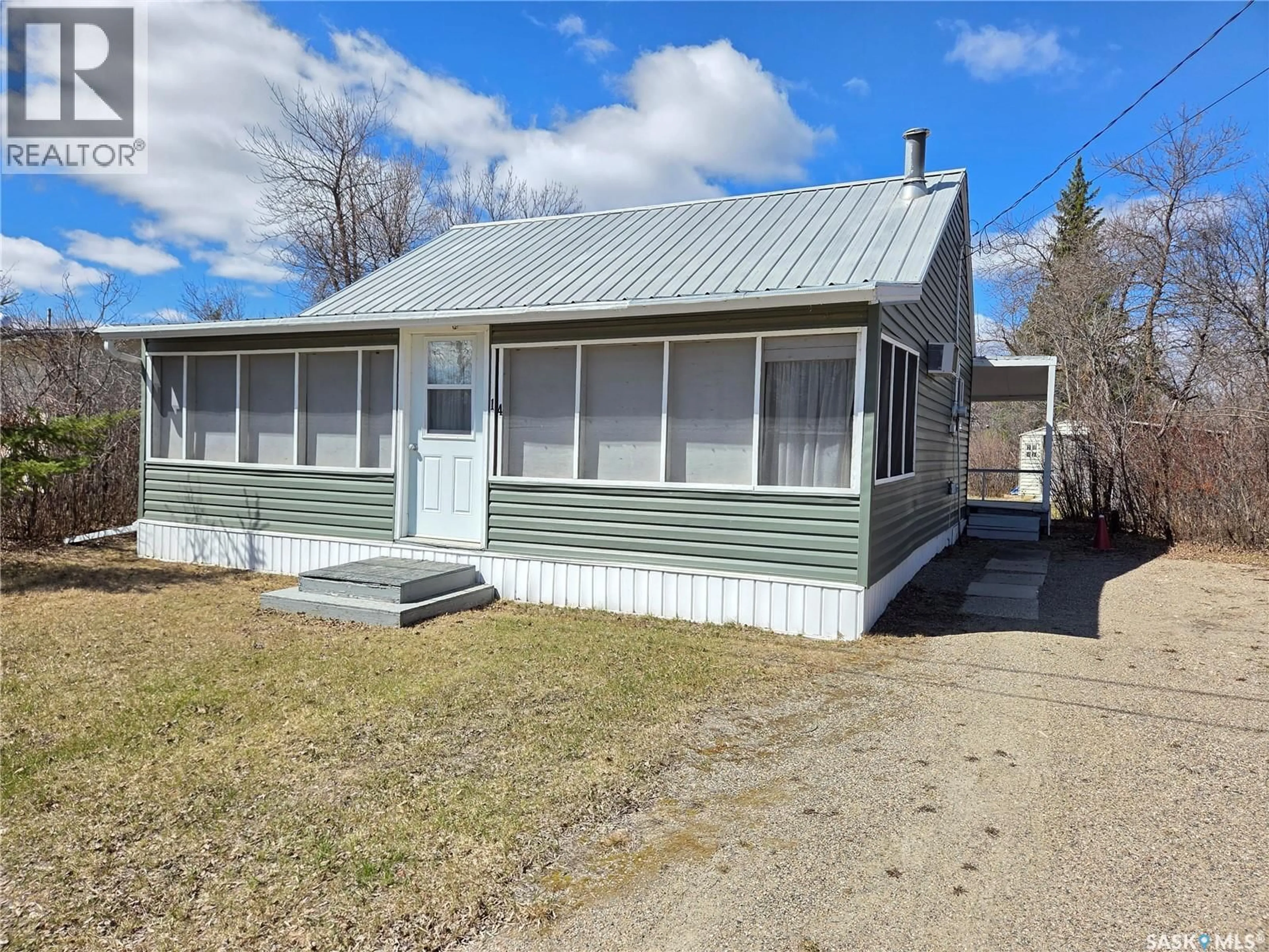 Home with vinyl exterior material, street for 14 ECHWAYATANKA DRIVE, White Bear IR 70 Saskatchewan S0C2S0