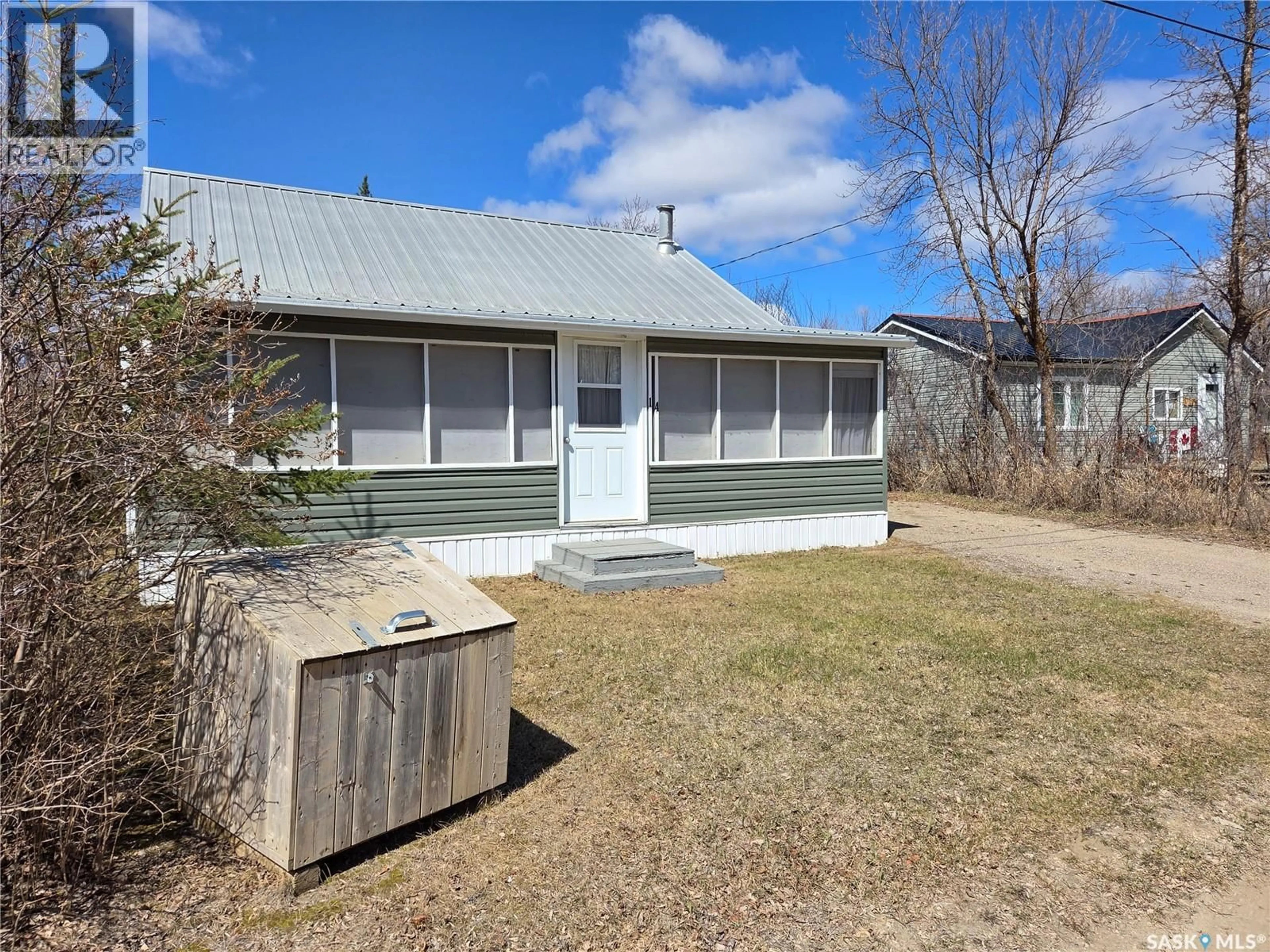 A pic from outside/outdoor area/front of a property/back of a property/a pic from drone, street for 14 ECHWAYATANKA DRIVE, White Bear IR 70 Saskatchewan S0C2S0