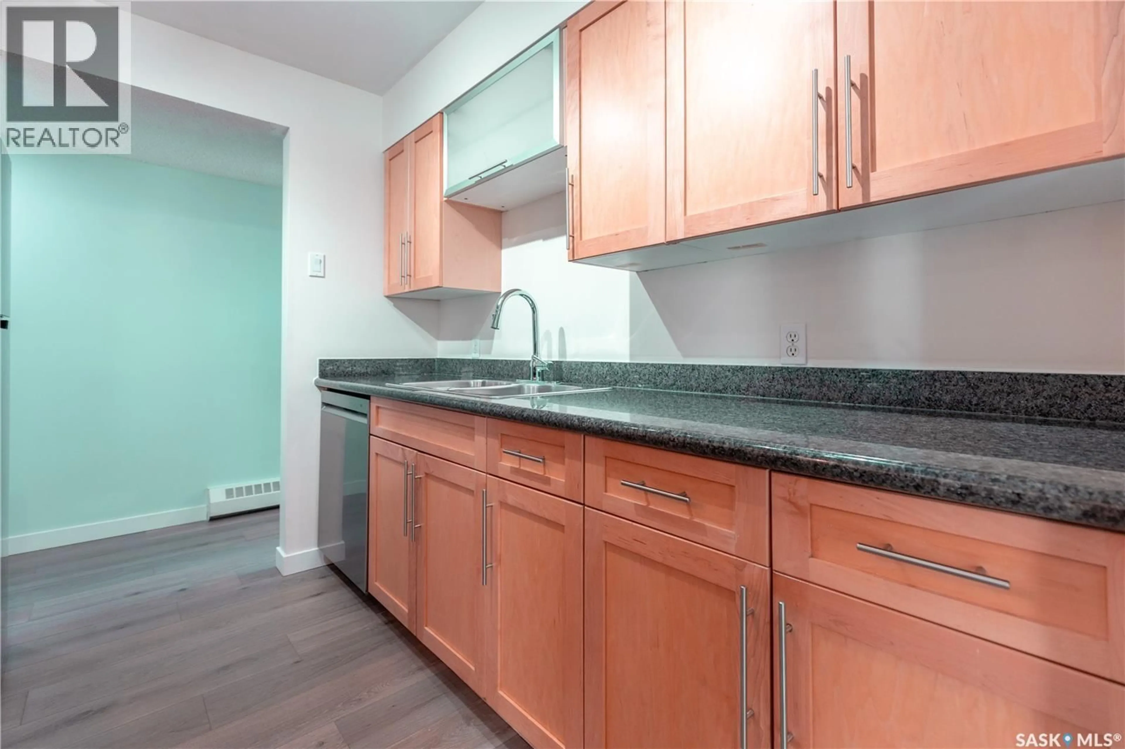 Standard kitchen, wood/laminate floor for 103 - 6 POWE STREET, Saskatoon Saskatchewan S7N1W5