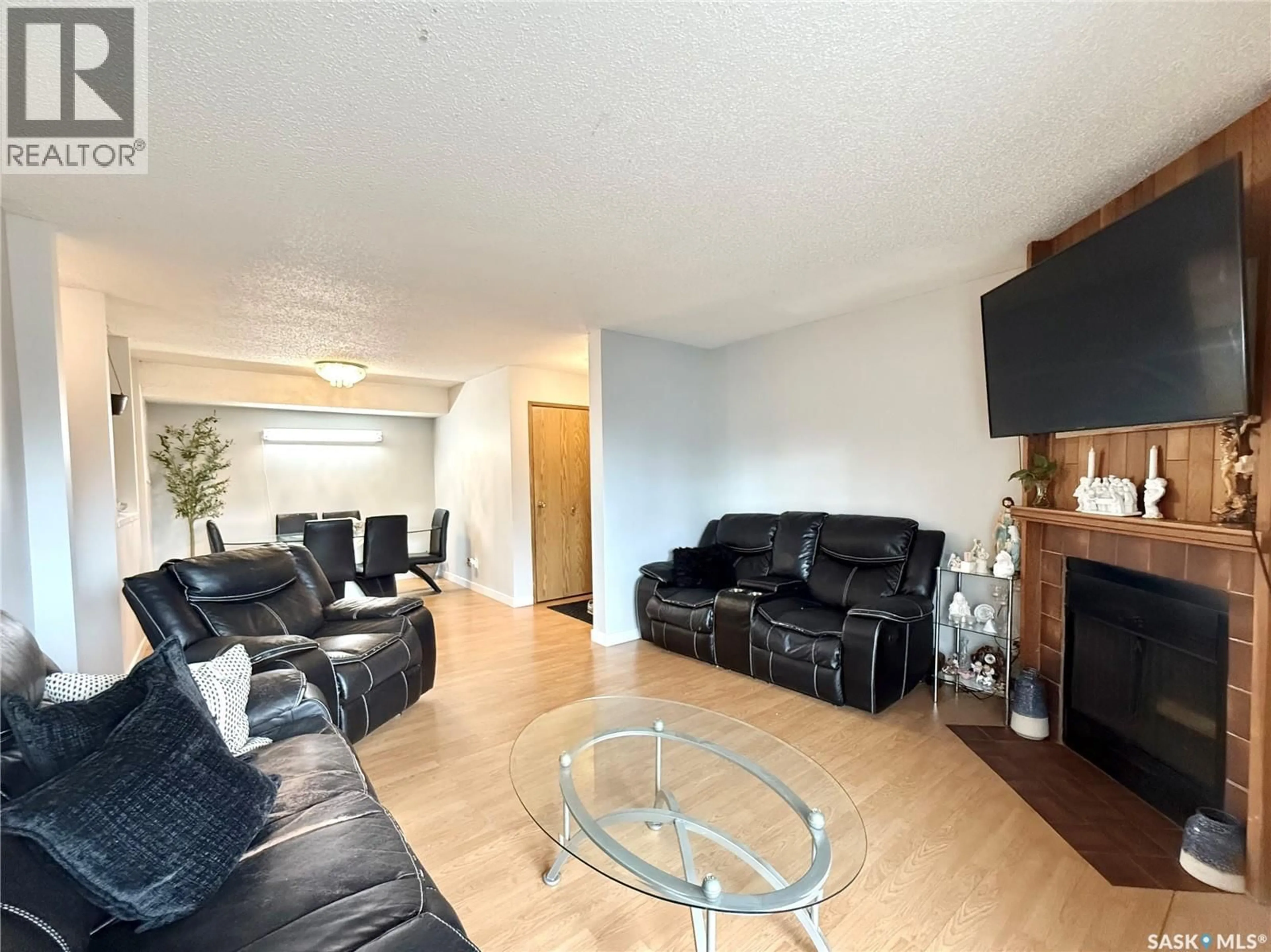 Living room with furniture, unknown for 101 - 335 KINGSMERE BOULEVARD, Saskatoon Saskatchewan S7J4J6