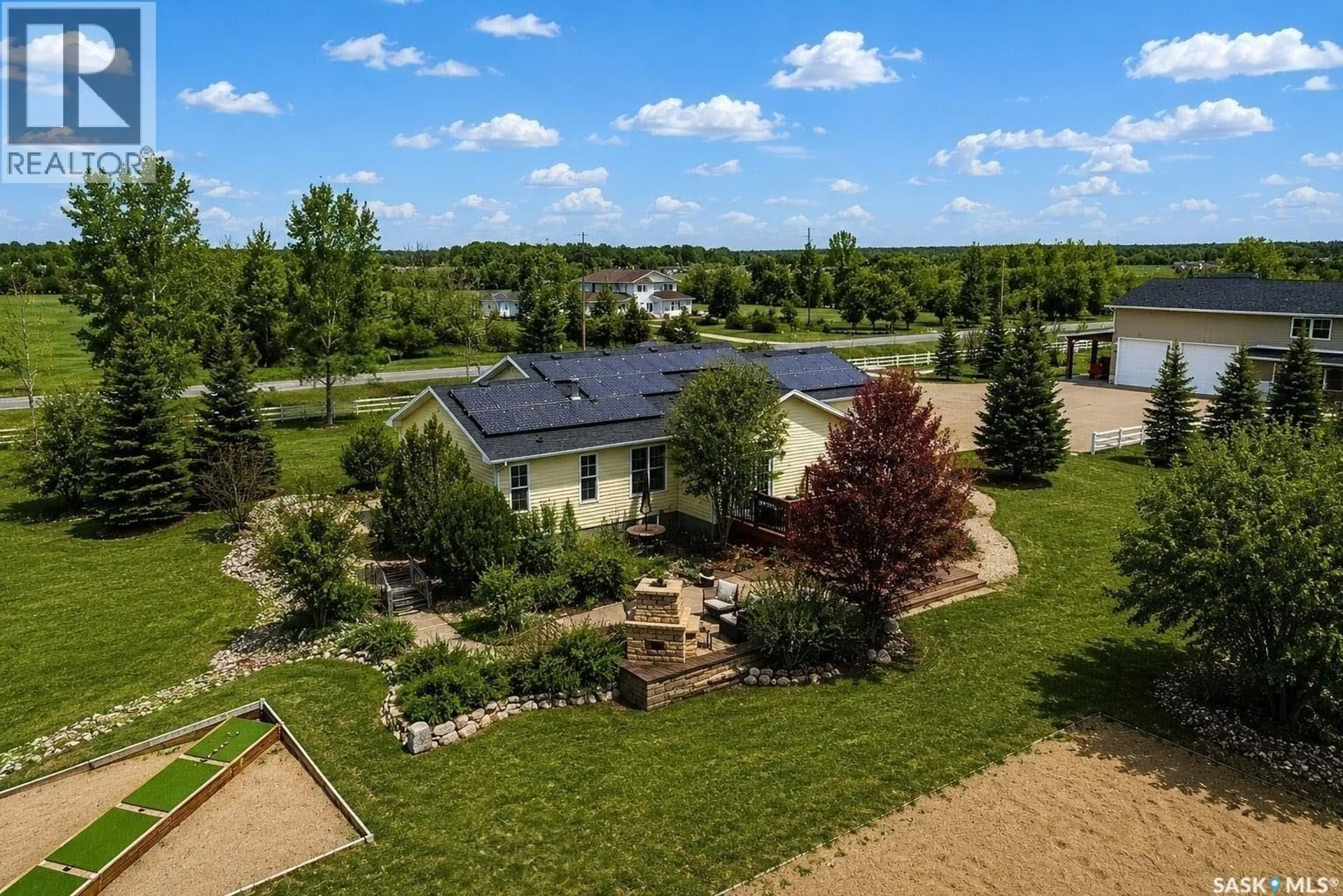 A pic from outside/outdoor area/front of a property/back of a property/a pic from drone, unknown for 16 POPLAR TRAIL, Edenwold Rm No.158 Saskatchewan S4L5B1