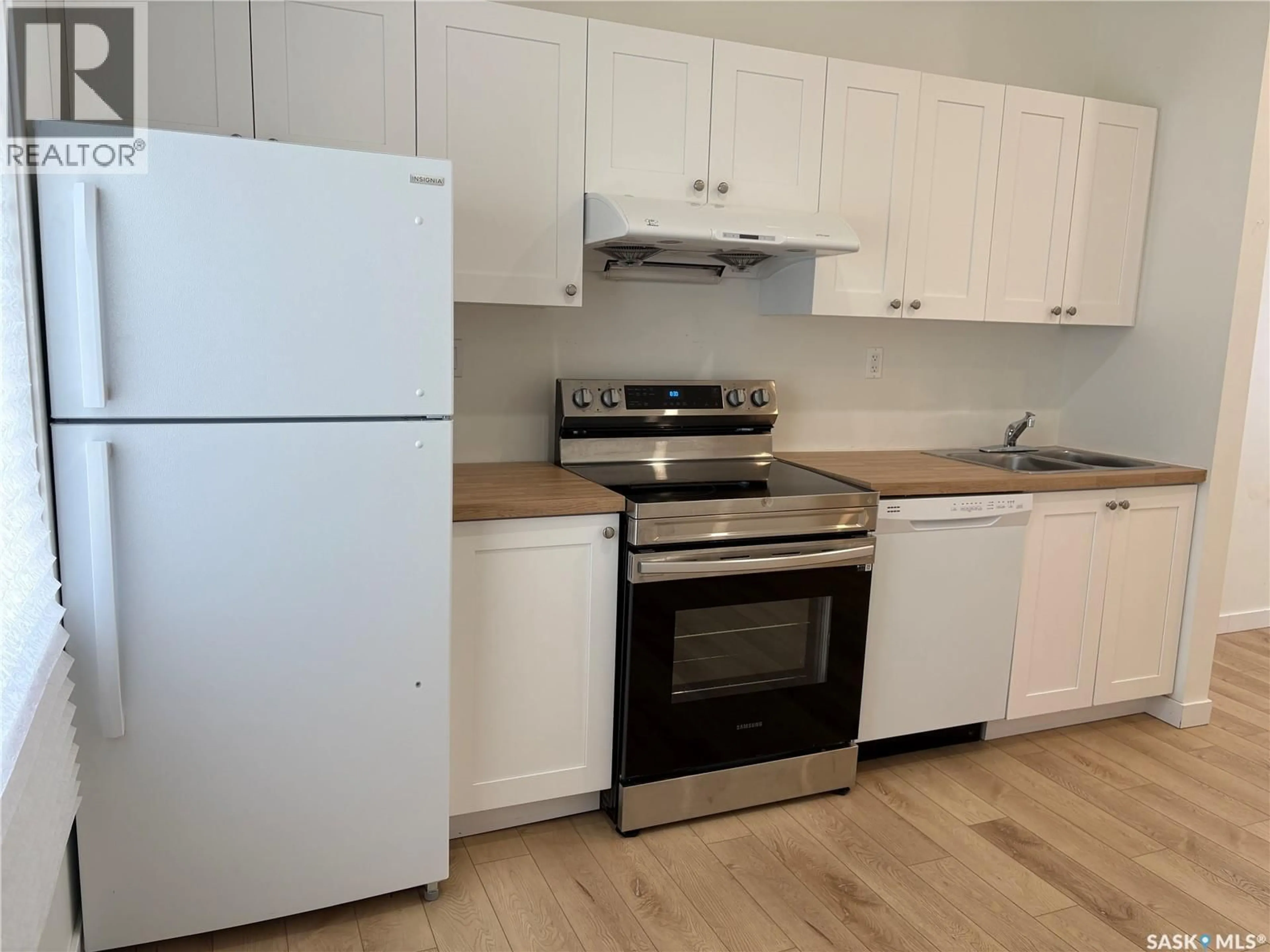 Standard kitchen, wood/laminate floor for 115-117 I AVENUE, Saskatoon Saskatchewan S7M1X7