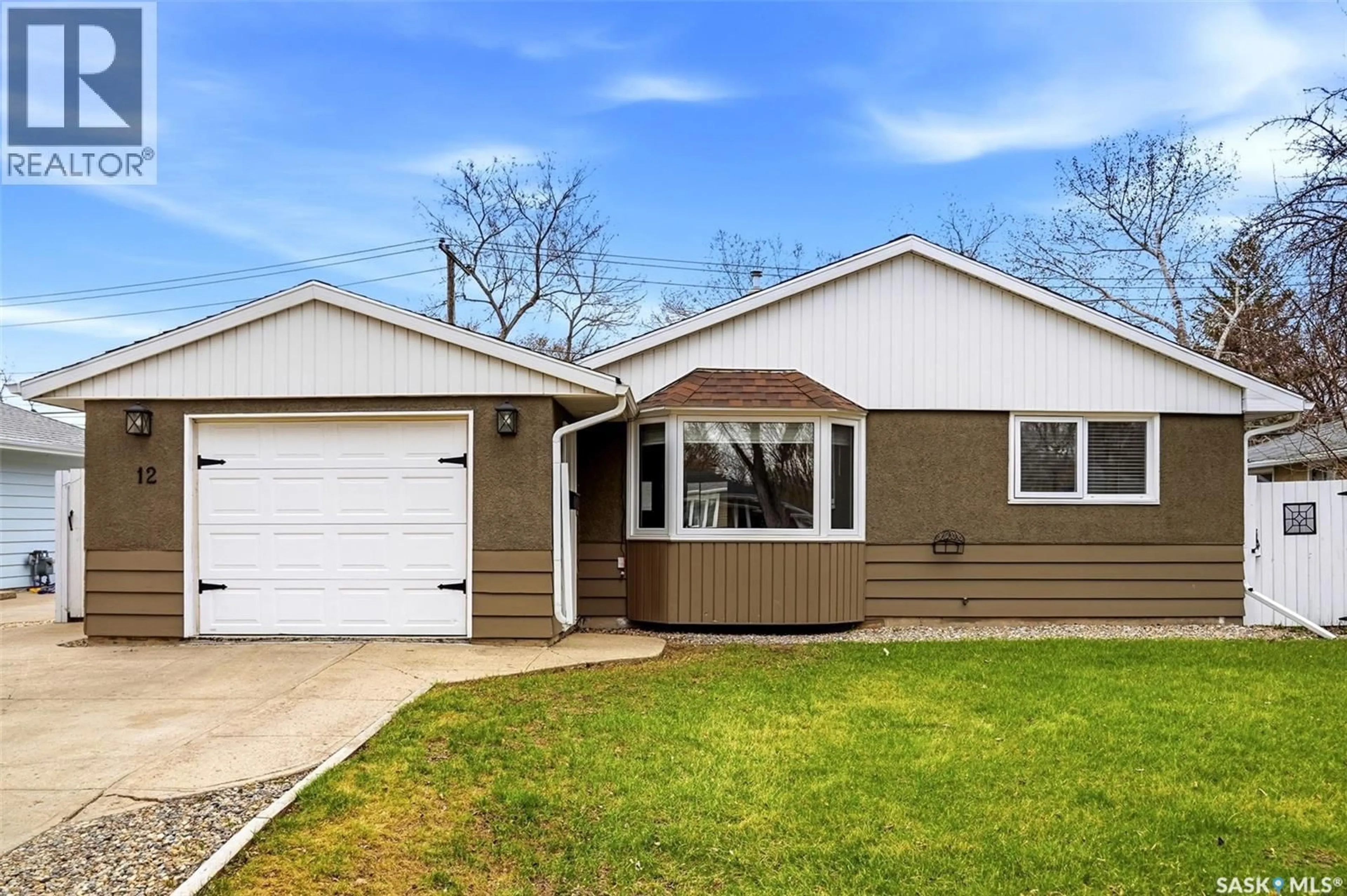 Home with vinyl exterior material, street for 12 FOX GLOVE CRESCENT, Regina Saskatchewan S4S0G9