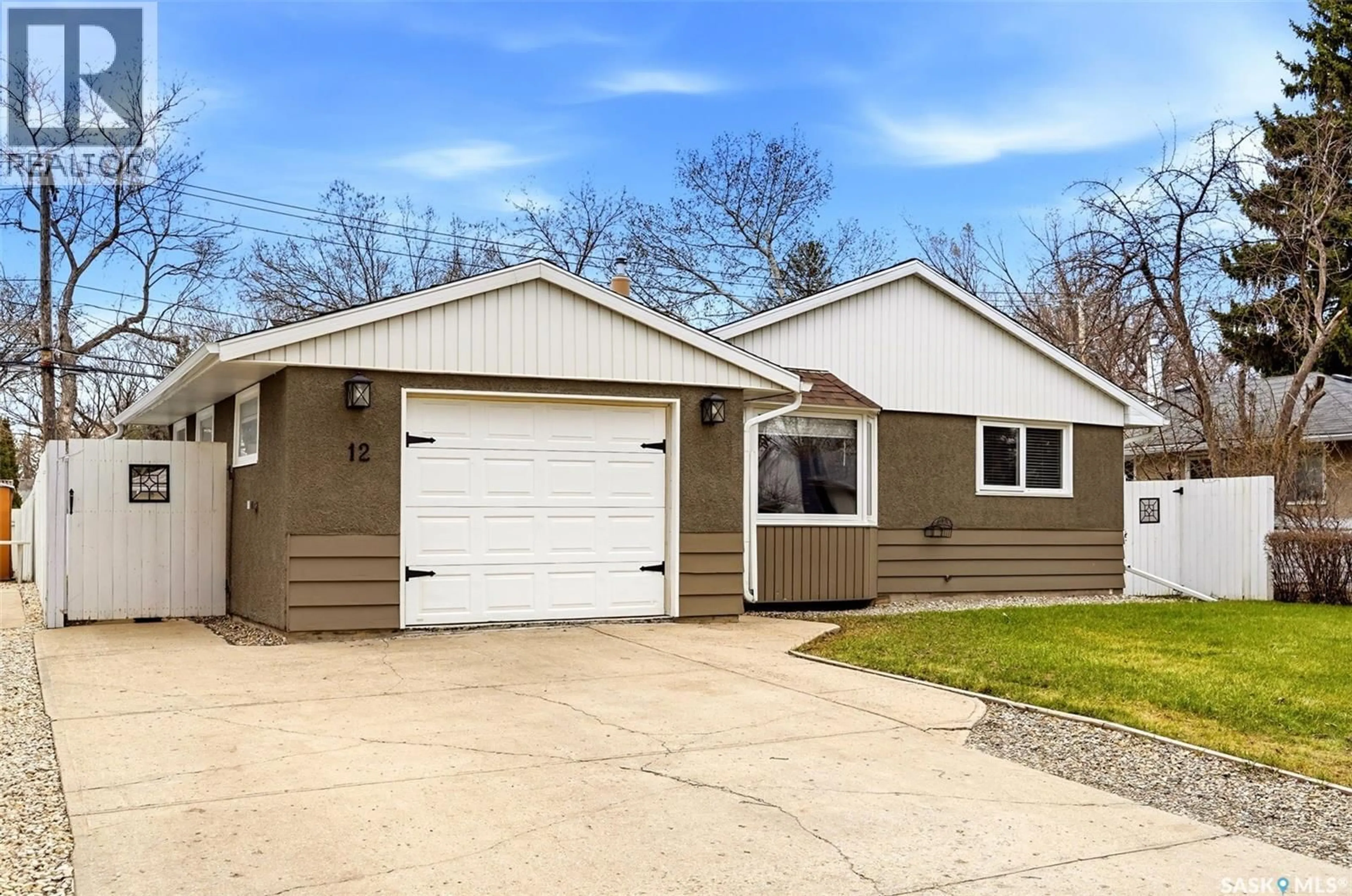Home with vinyl exterior material, street for 12 FOX GLOVE CRESCENT, Regina Saskatchewan S4S0G9