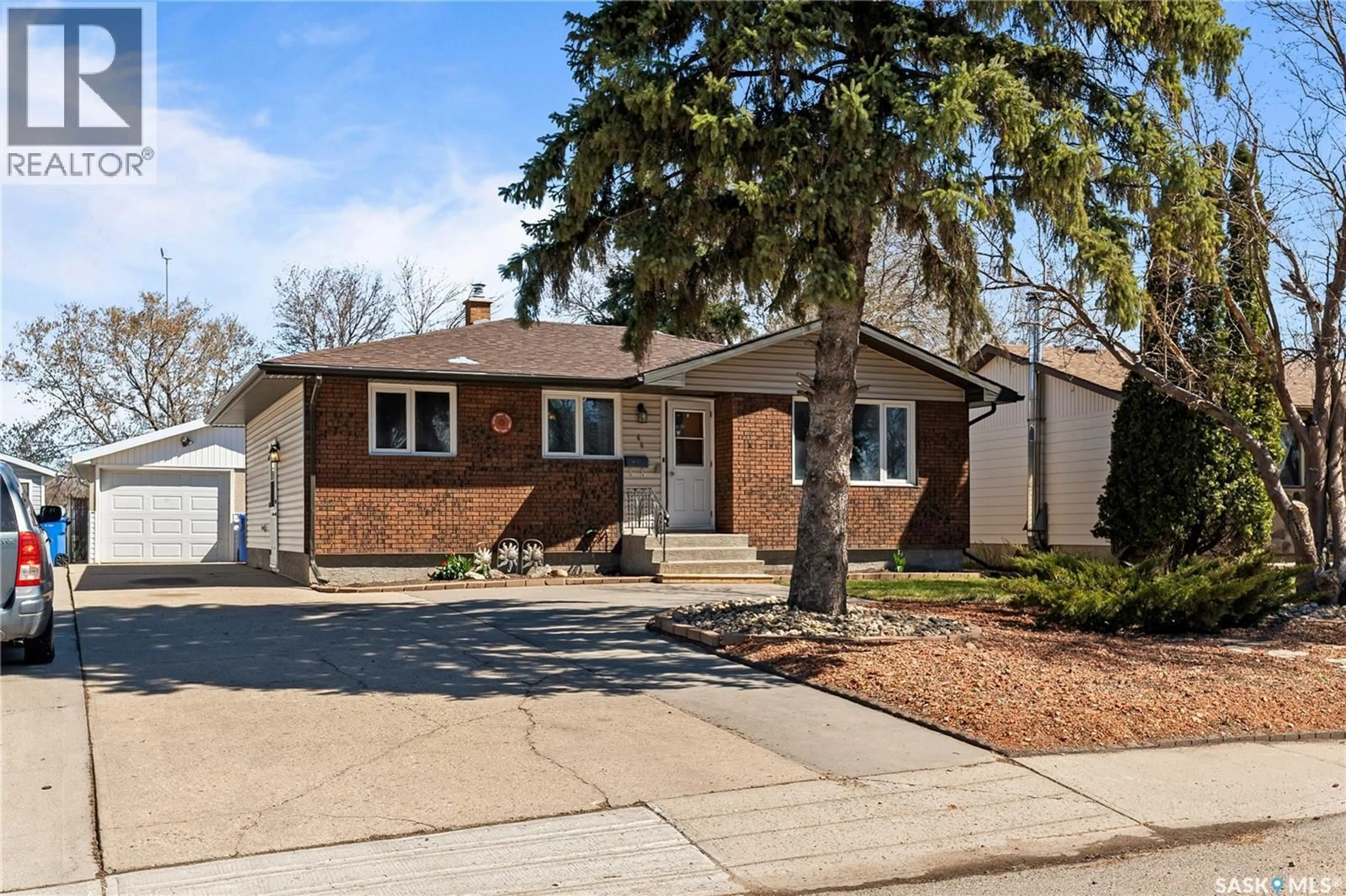 Home with brick exterior material, street for 46 HAMMOND ROAD, Regina Saskatchewan S4R3C6