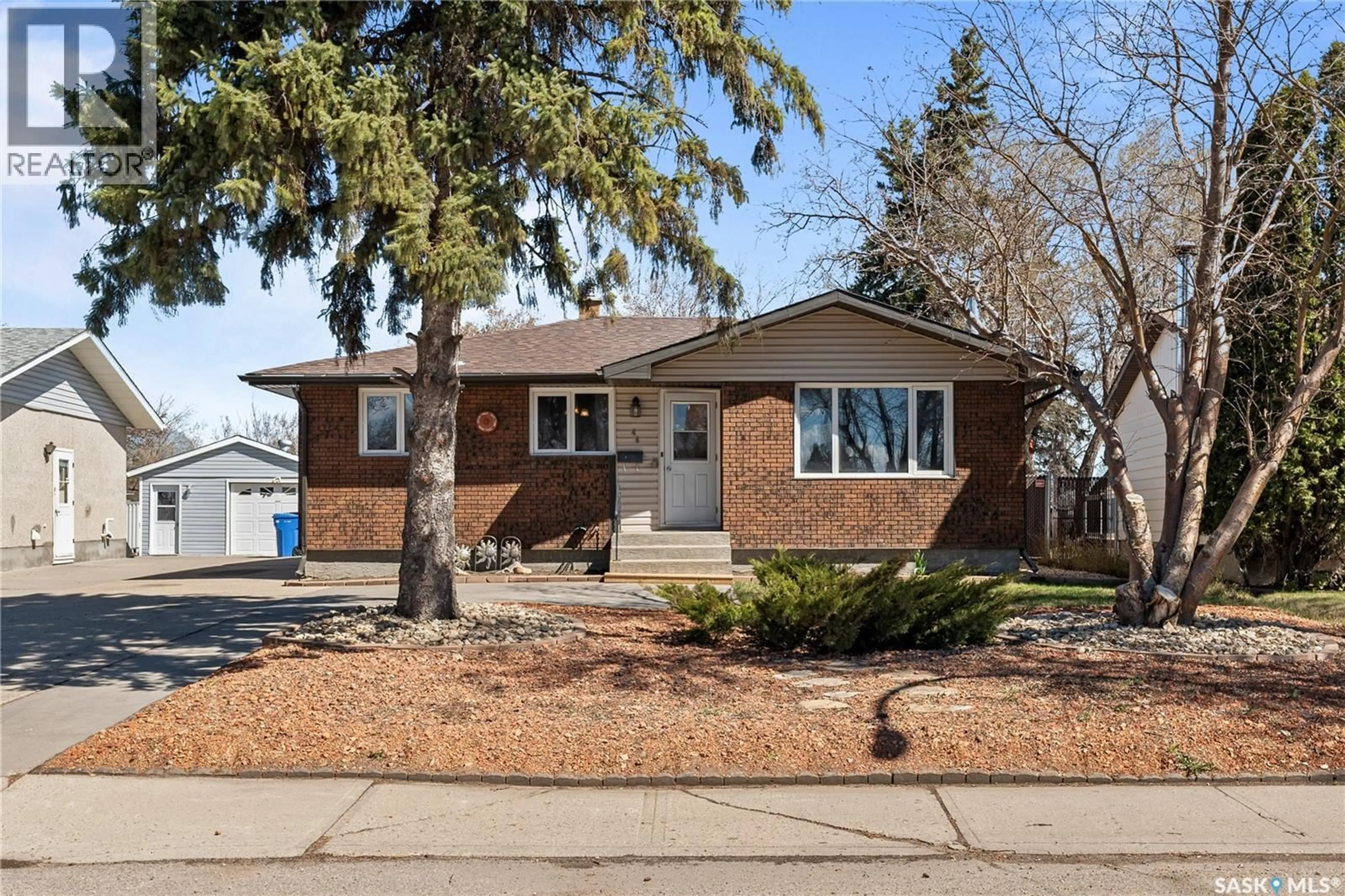 Home with brick exterior material, street for 46 HAMMOND ROAD, Regina Saskatchewan S4R3C6