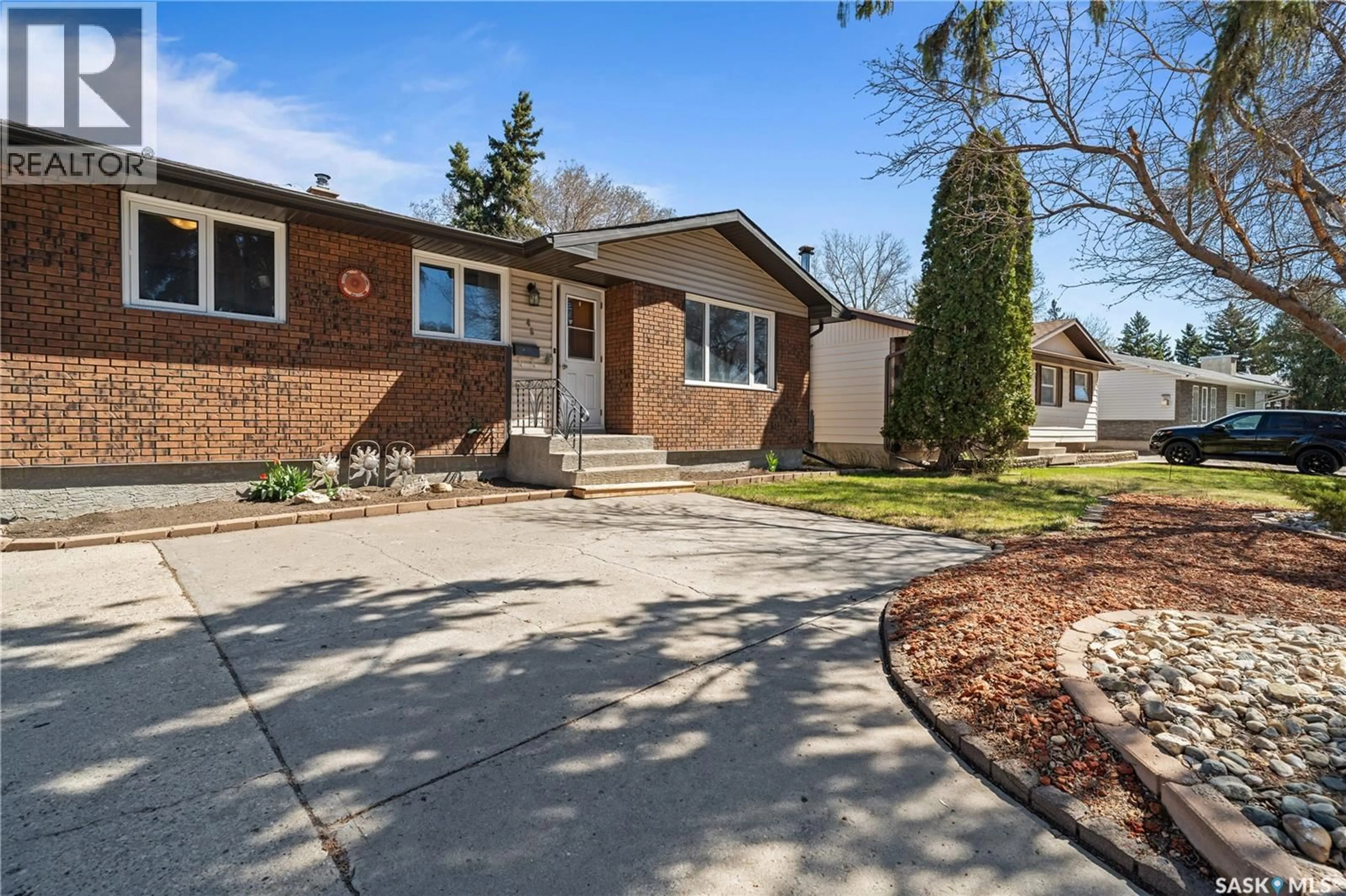Home with brick exterior material, street for 46 HAMMOND ROAD, Regina Saskatchewan S4R3C6