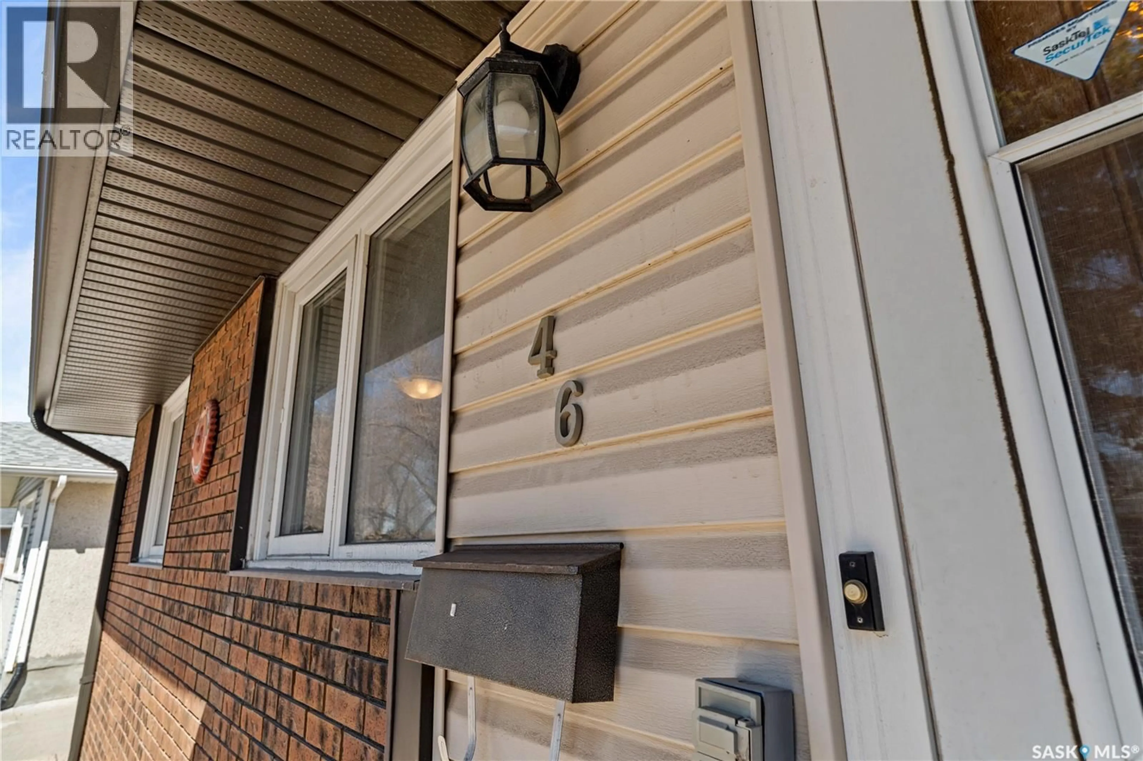 Home with vinyl exterior material, street for 46 HAMMOND ROAD, Regina Saskatchewan S4R3C6