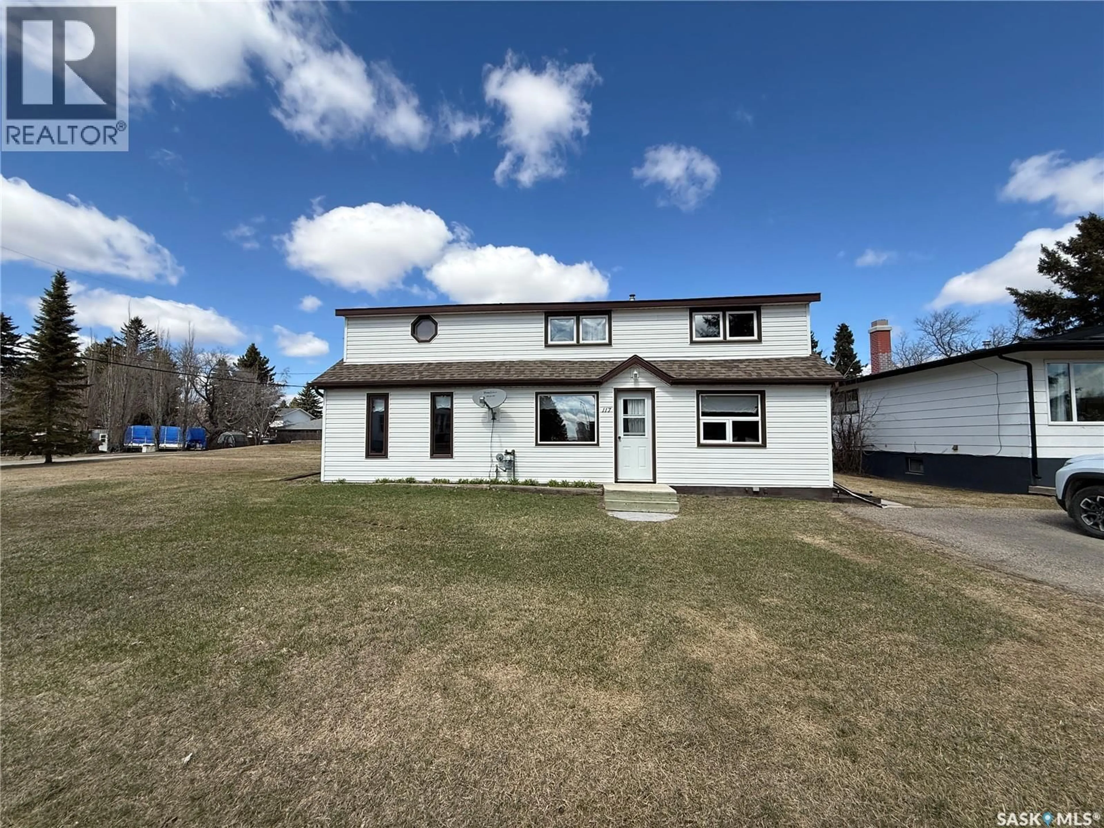 A pic from outside/outdoor area/front of a property/back of a property/a pic from drone, building for 117 3RD AVENUE, Watson Saskatchewan S0K4V0