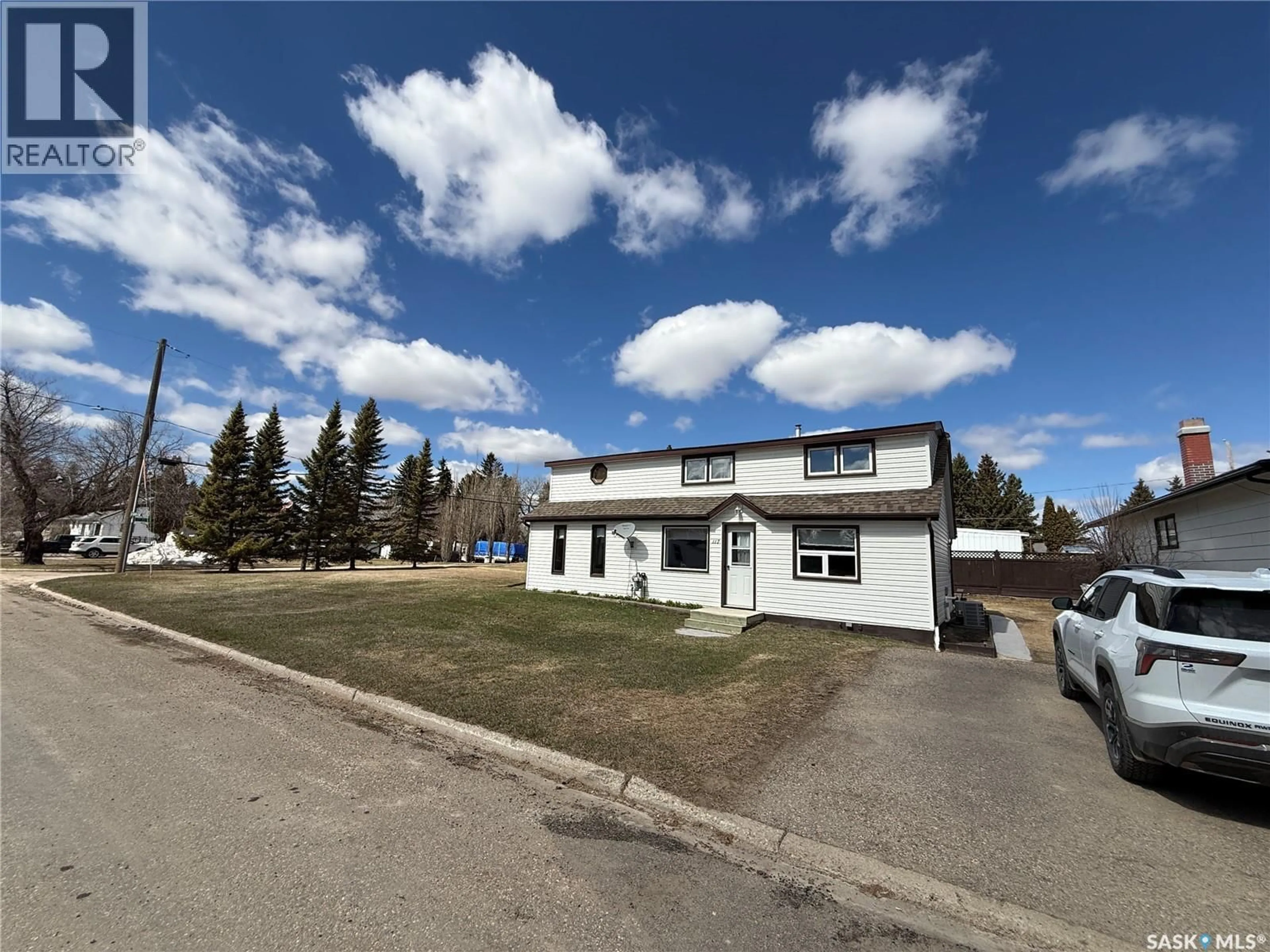 A pic from outside/outdoor area/front of a property/back of a property/a pic from drone, street for 117 3RD AVENUE, Watson Saskatchewan S0K4V0